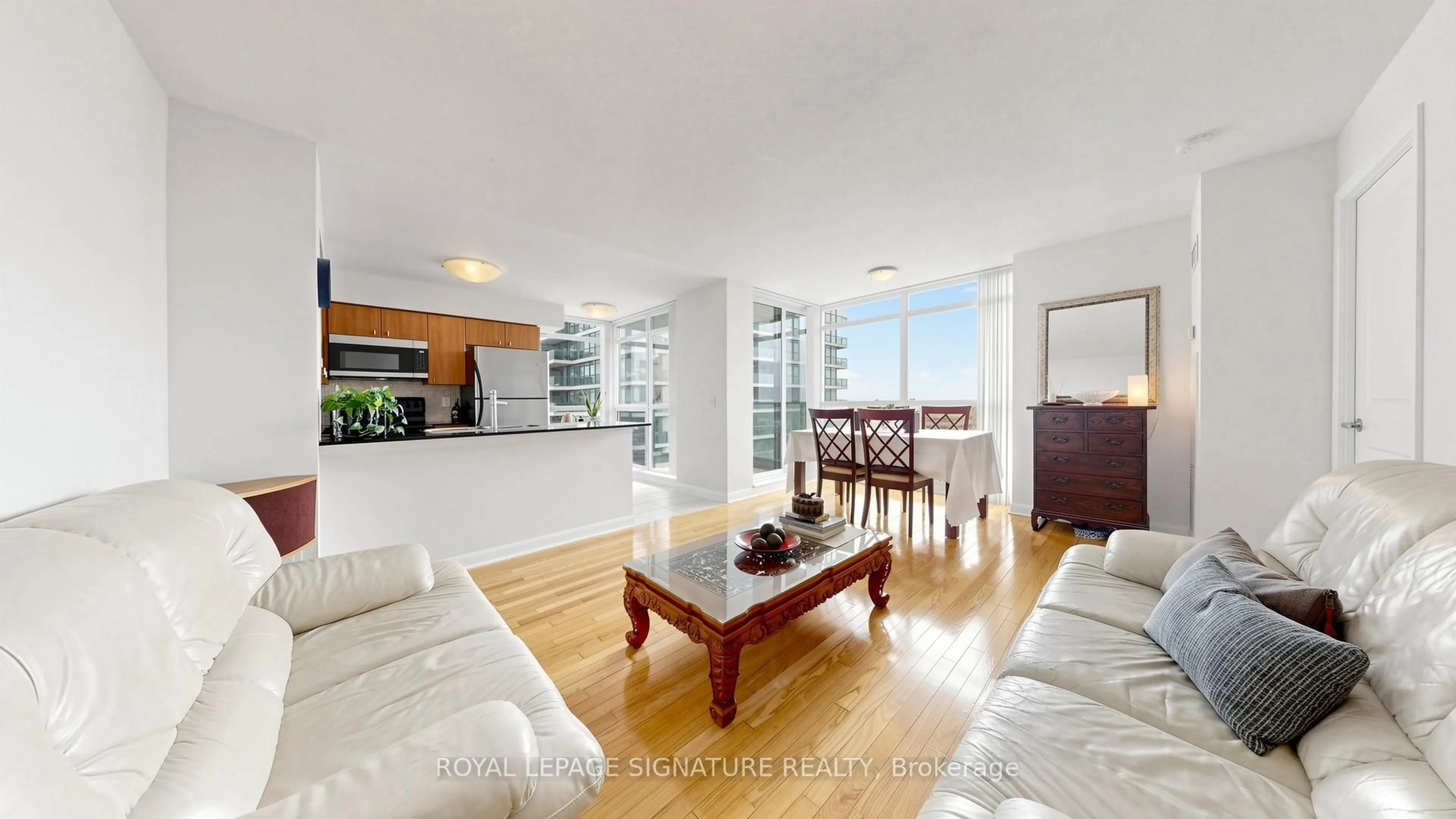 Open concept kitchen, wood/laminate floor for 235 SHERWAY GARDENS Rd #1603, Toronto Ontario M9C 0A2