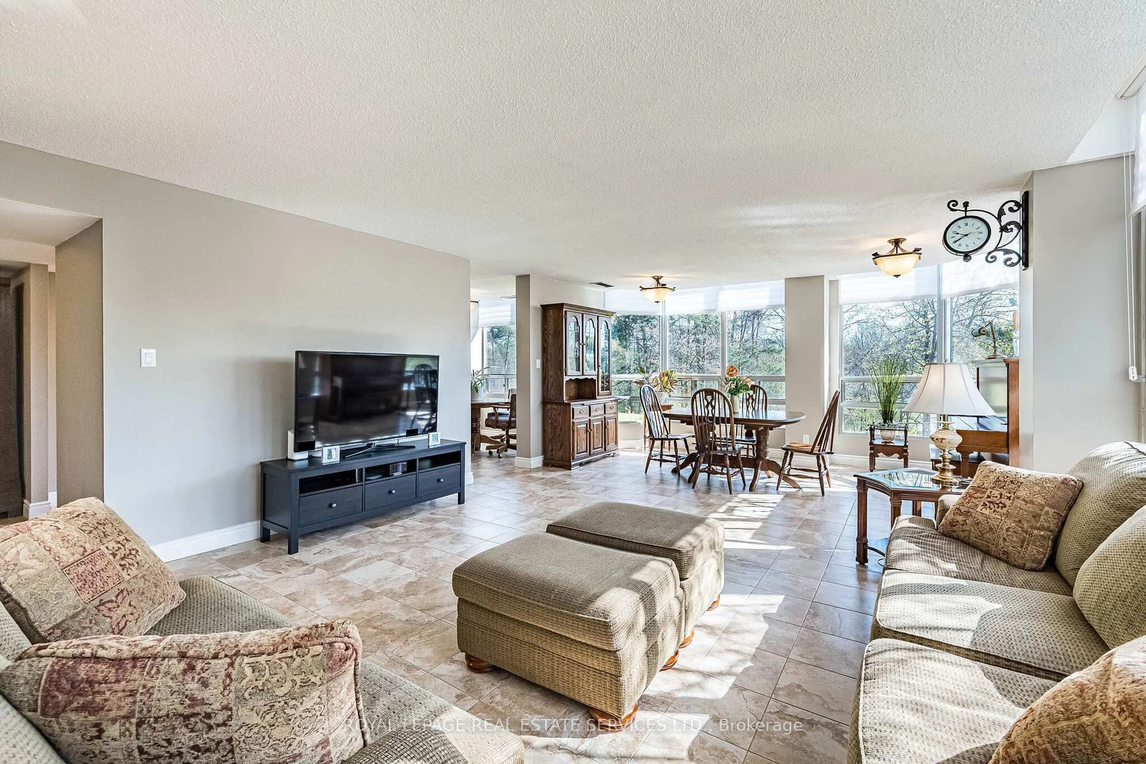 Living room with furniture, unknown for 310 Mill St #102, Brampton Ontario L6Y 3B1