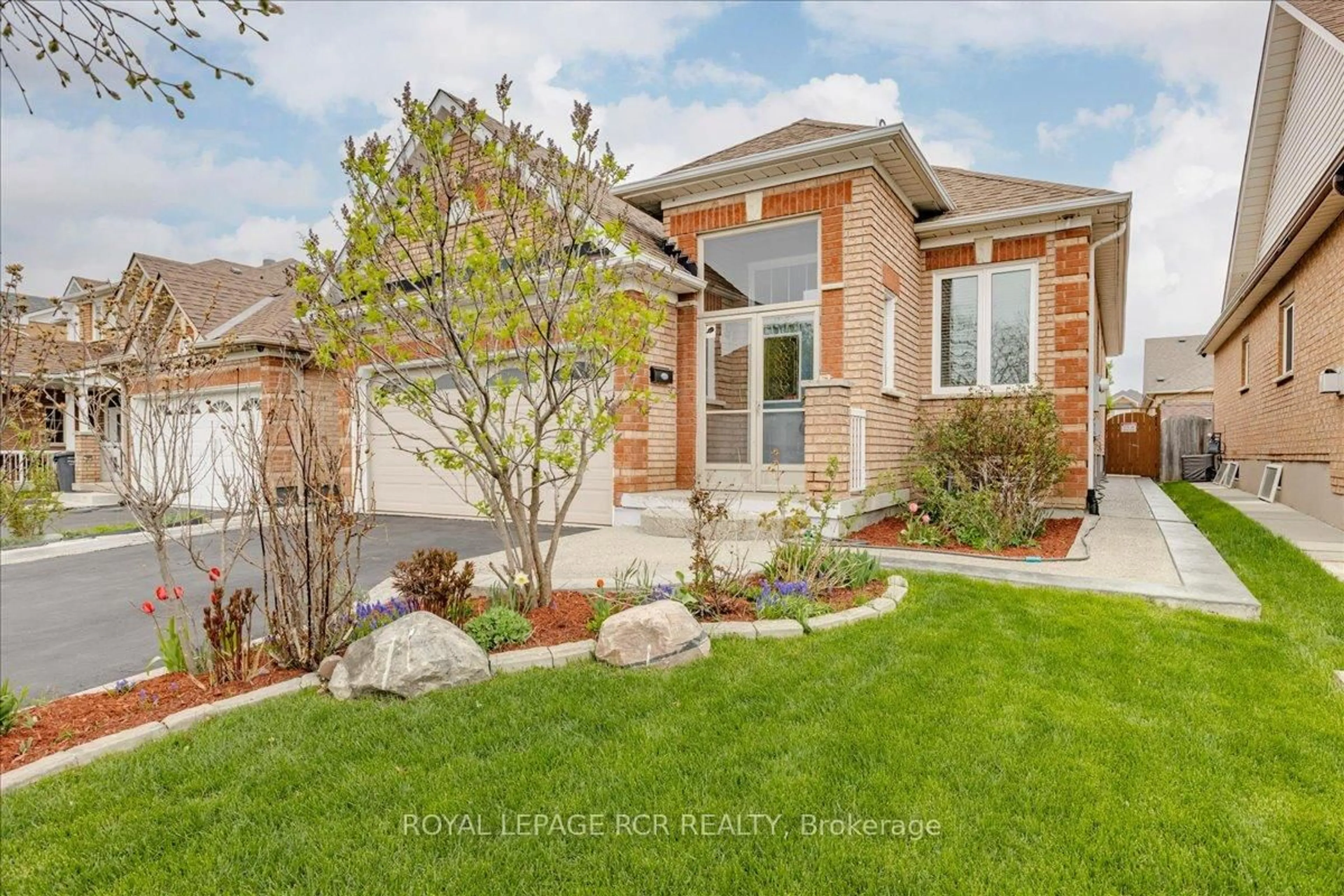Home with brick exterior material, street for 293 Van Kirk Dr, Brampton Ontario L7A 1M3