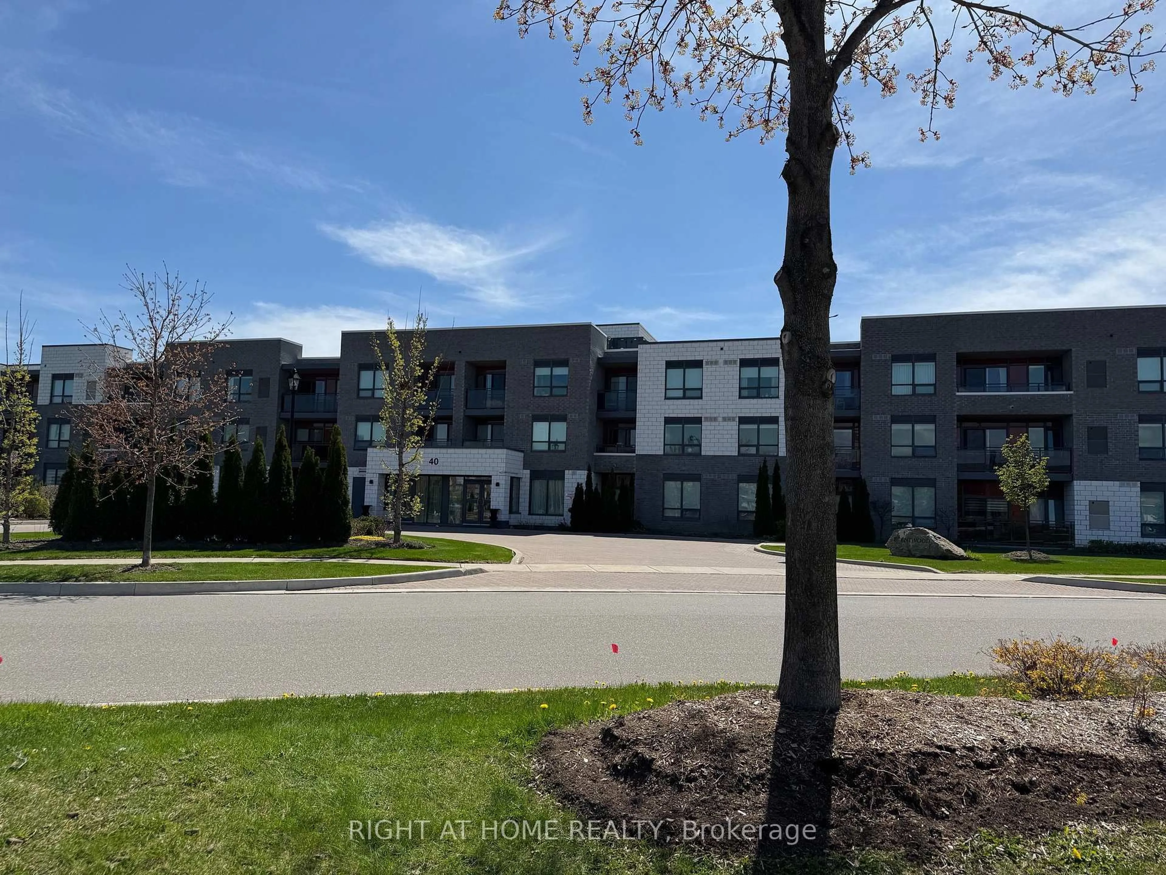 A pic from outside/outdoor area/front of a property/back of a property/a pic from drone, street for 40 Via Rosedale Way #307, Brampton Ontario L6R 4A4