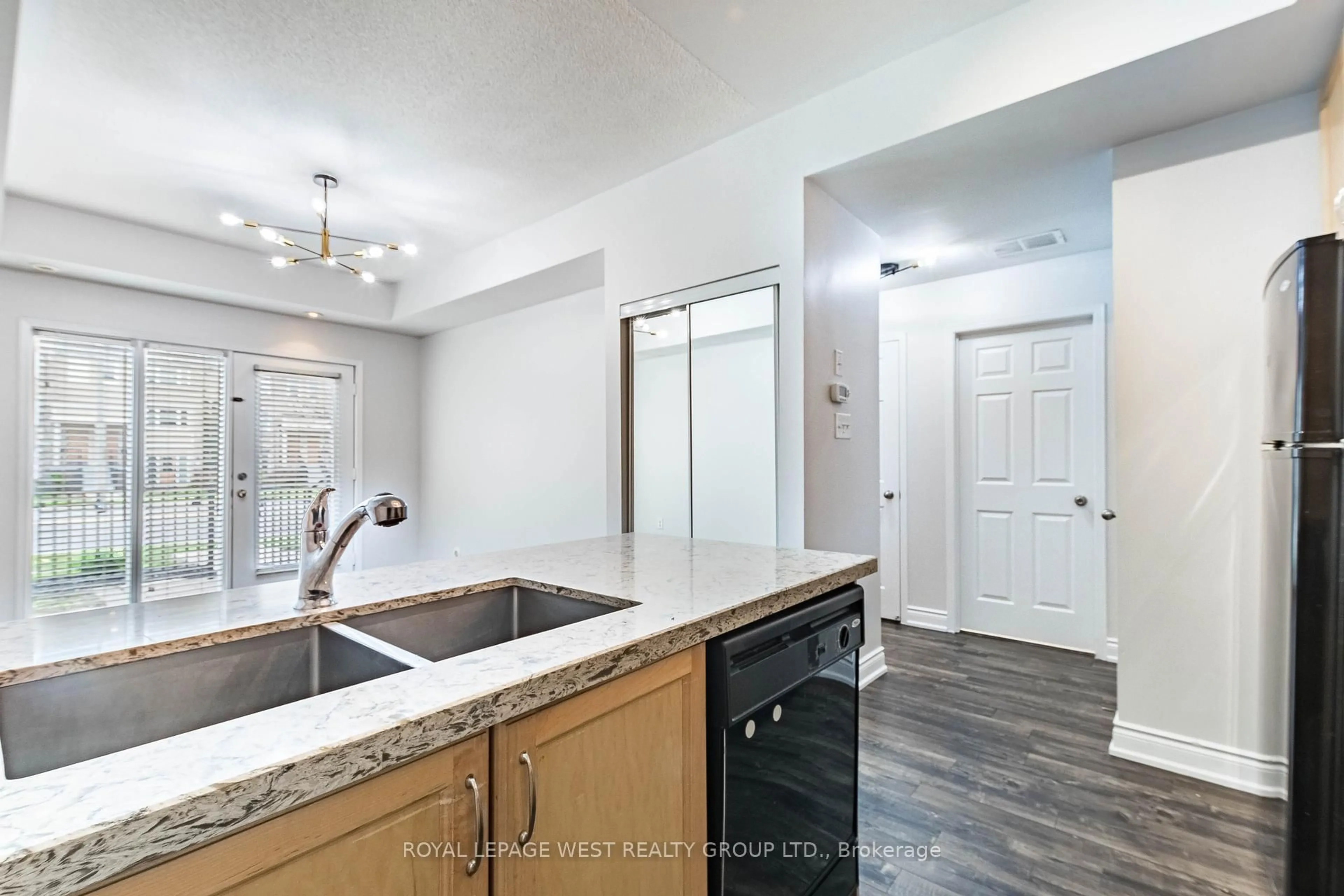 Open concept kitchen, ceramic/tile floor for 5035 Oscar Peterson Blvd #110, Mississauga Ontario L5M 0P4