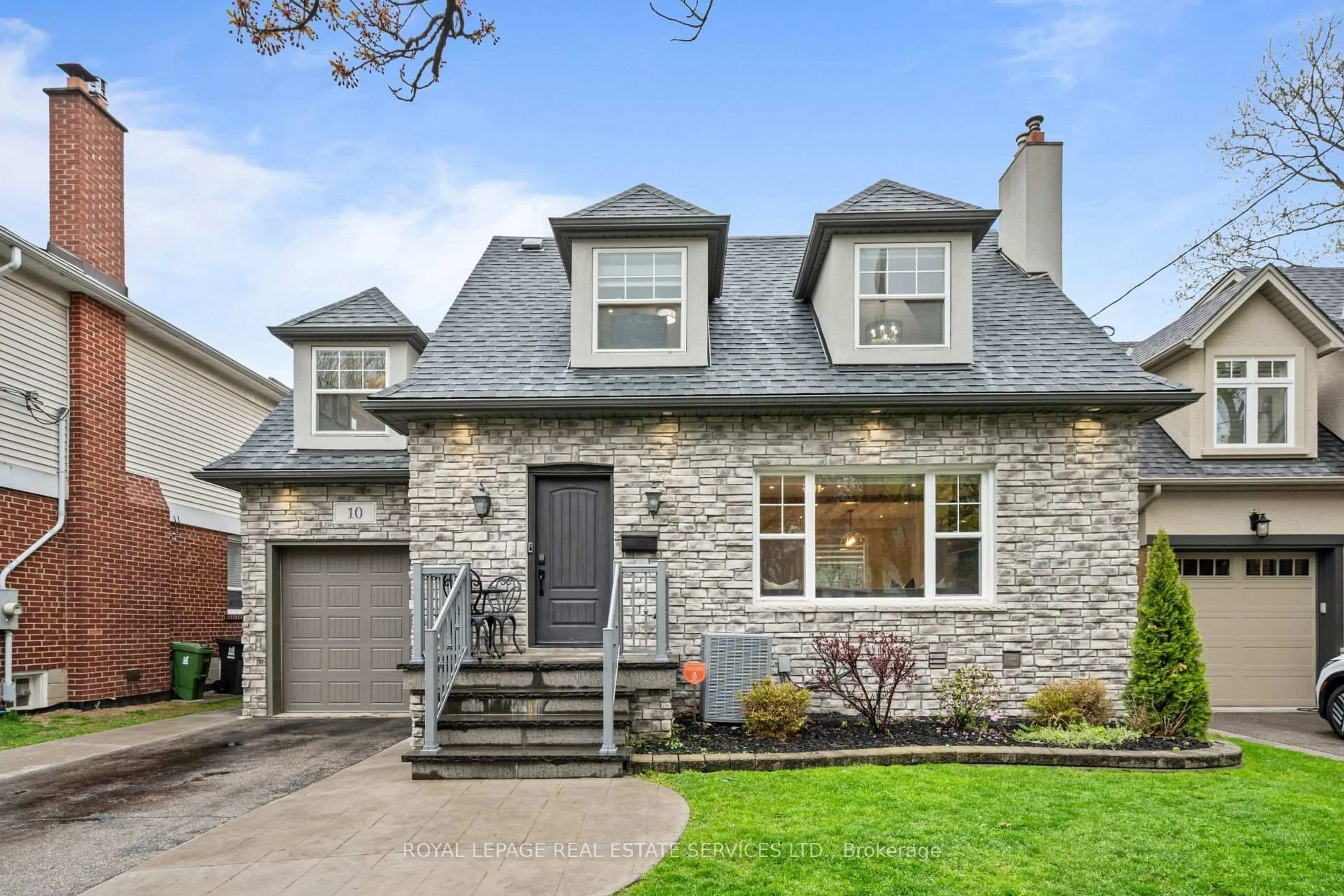 Home with brick exterior material, street for 10 Glenellen Dr, Toronto Ontario M8Y 2H3