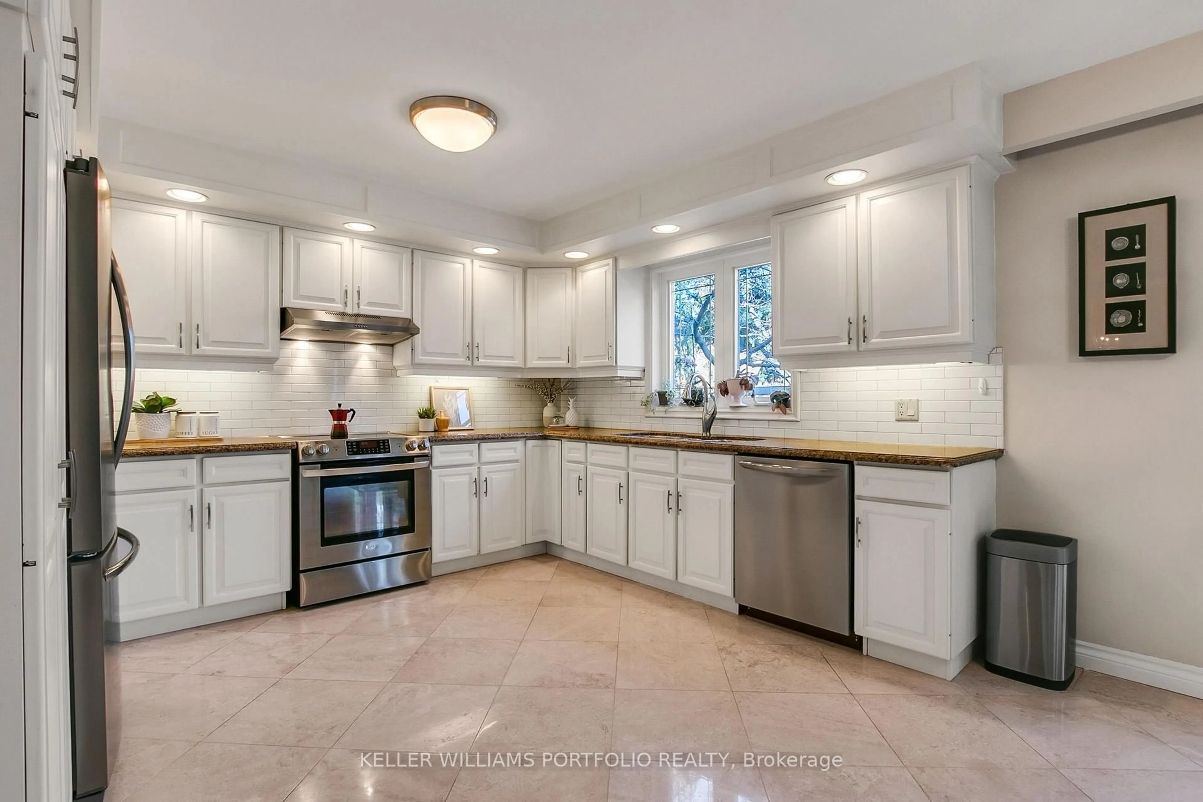 Open concept kitchen, ceramic/tile floor for 4 Neiltree Crt, Toronto Ontario M9C 5C3