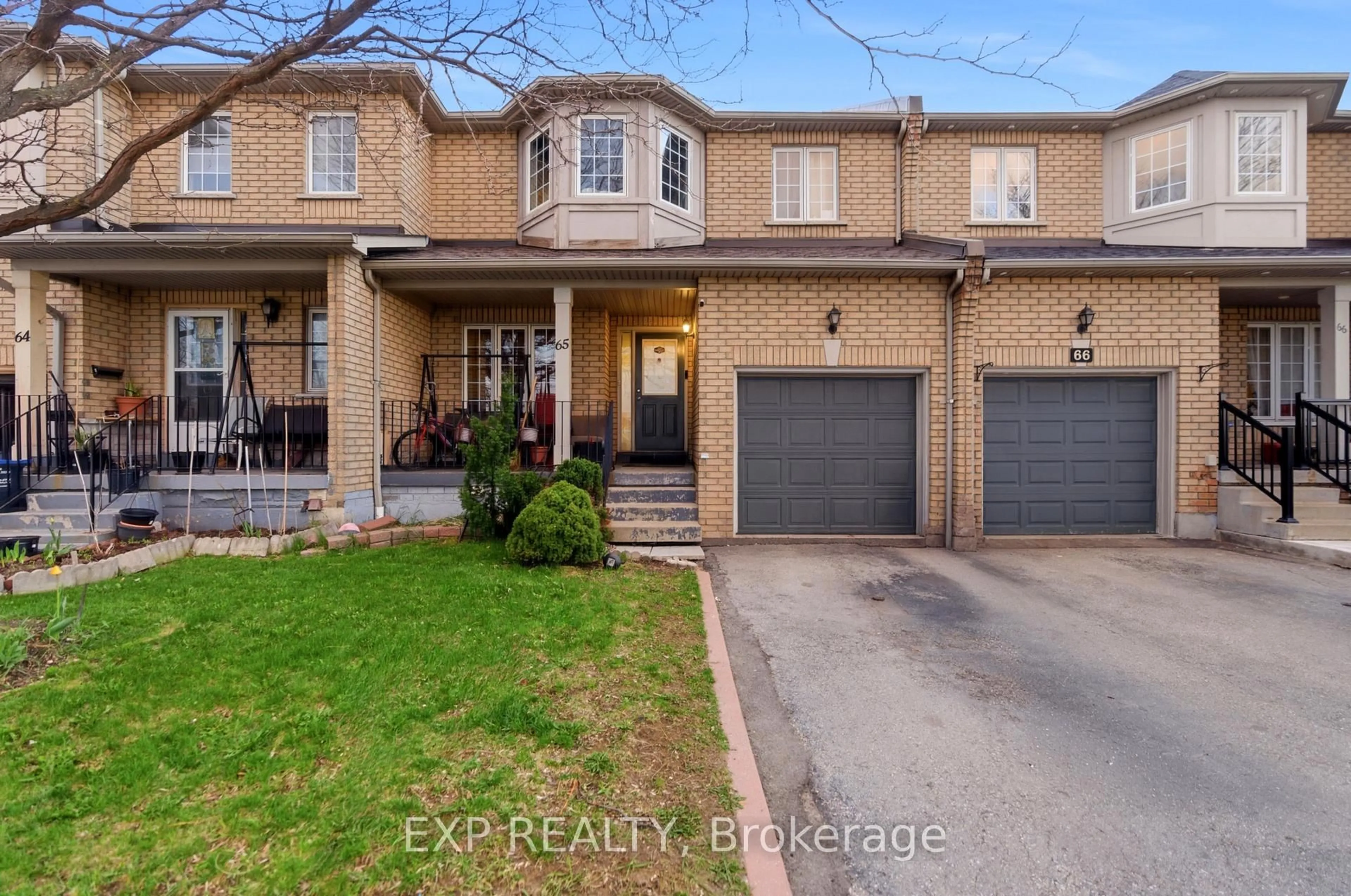 Home with brick exterior material, street for 7115 Rexwood Rd #65, Mississauga Ontario L4T 4L4