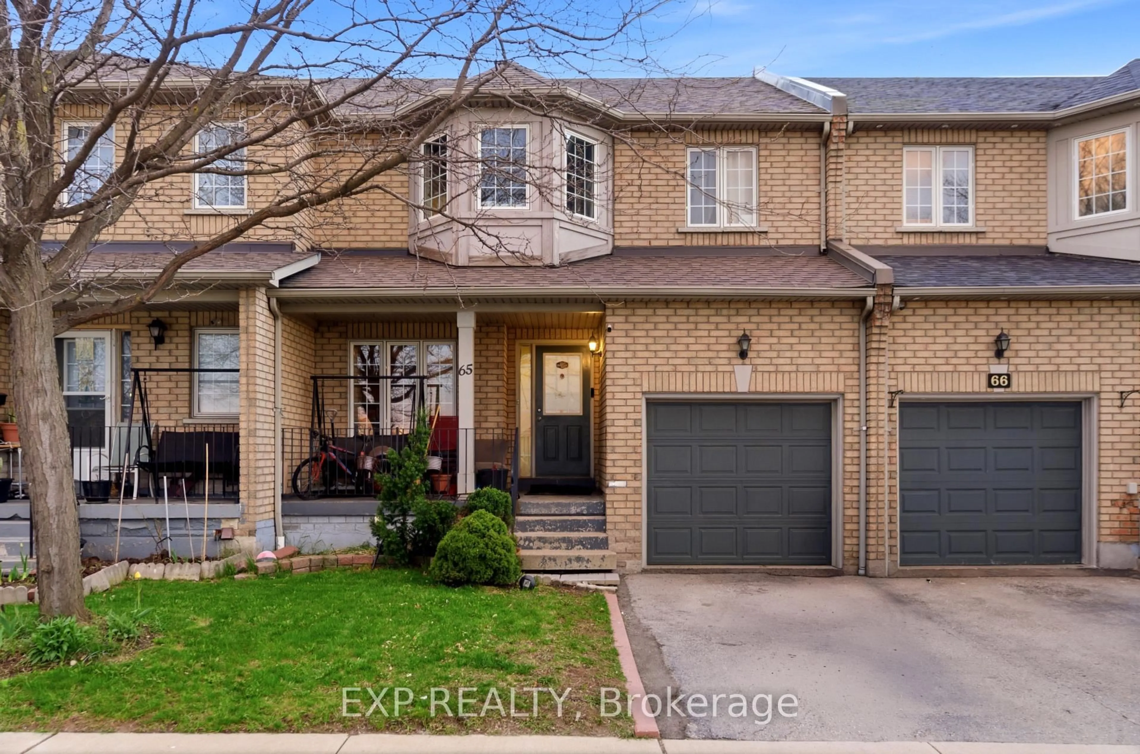 Home with brick exterior material, street for 7115 Rexwood Rd #65, Mississauga Ontario L4T 4L4