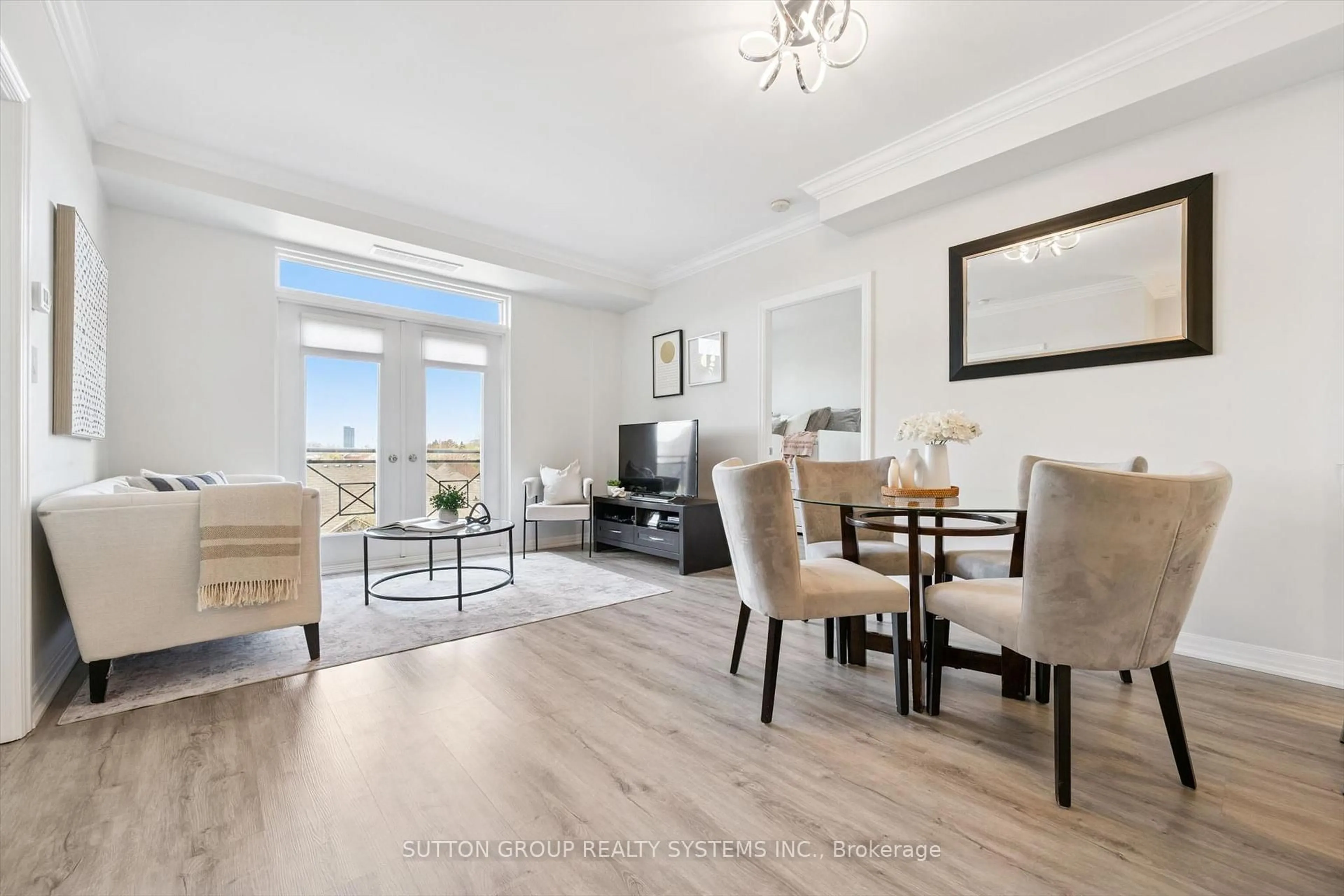 Living room with furniture, wood/laminate floor for 245 Dalesford Rd #505, Toronto Ontario M8Y 4H7