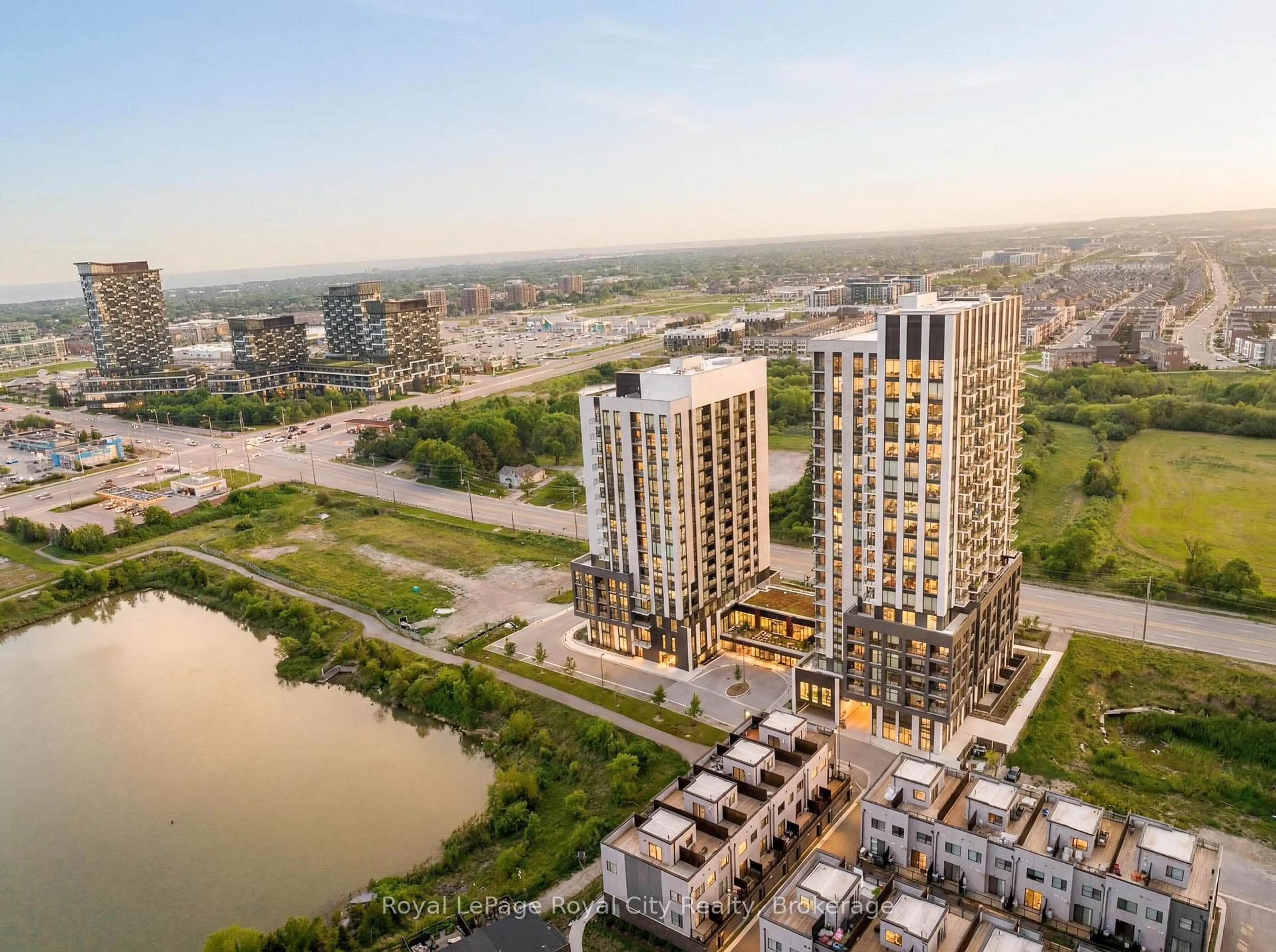 A pic from outside/outdoor area/front of a property/back of a property/a pic from drone, city buildings view from balcony for 3071 Trafalgar Rd #604, Oakville Ontario L6H 8C6