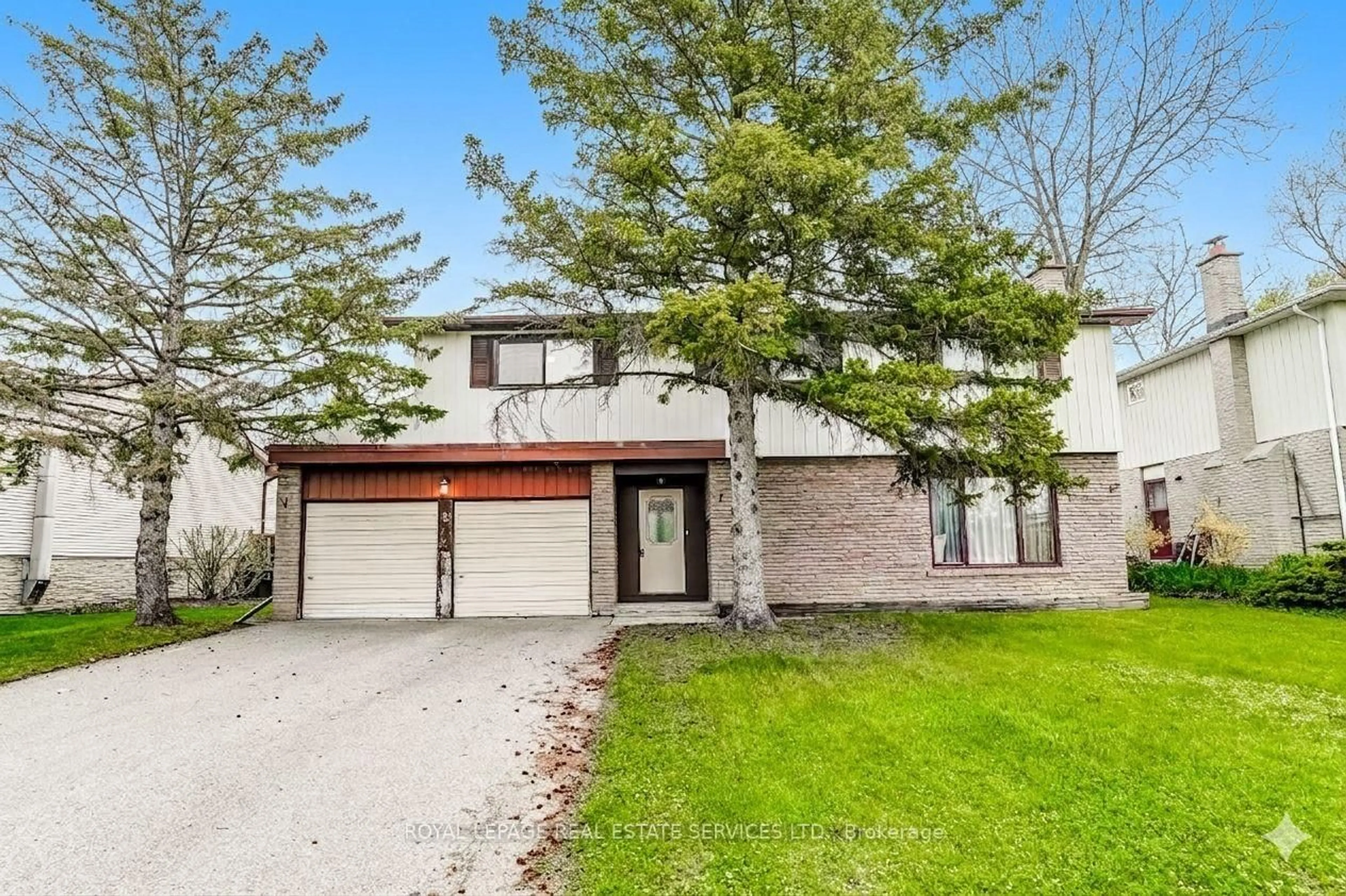 Home with brick exterior material, street for 8 Kenninghall Blvd, Mississauga Ontario L5N 1J4