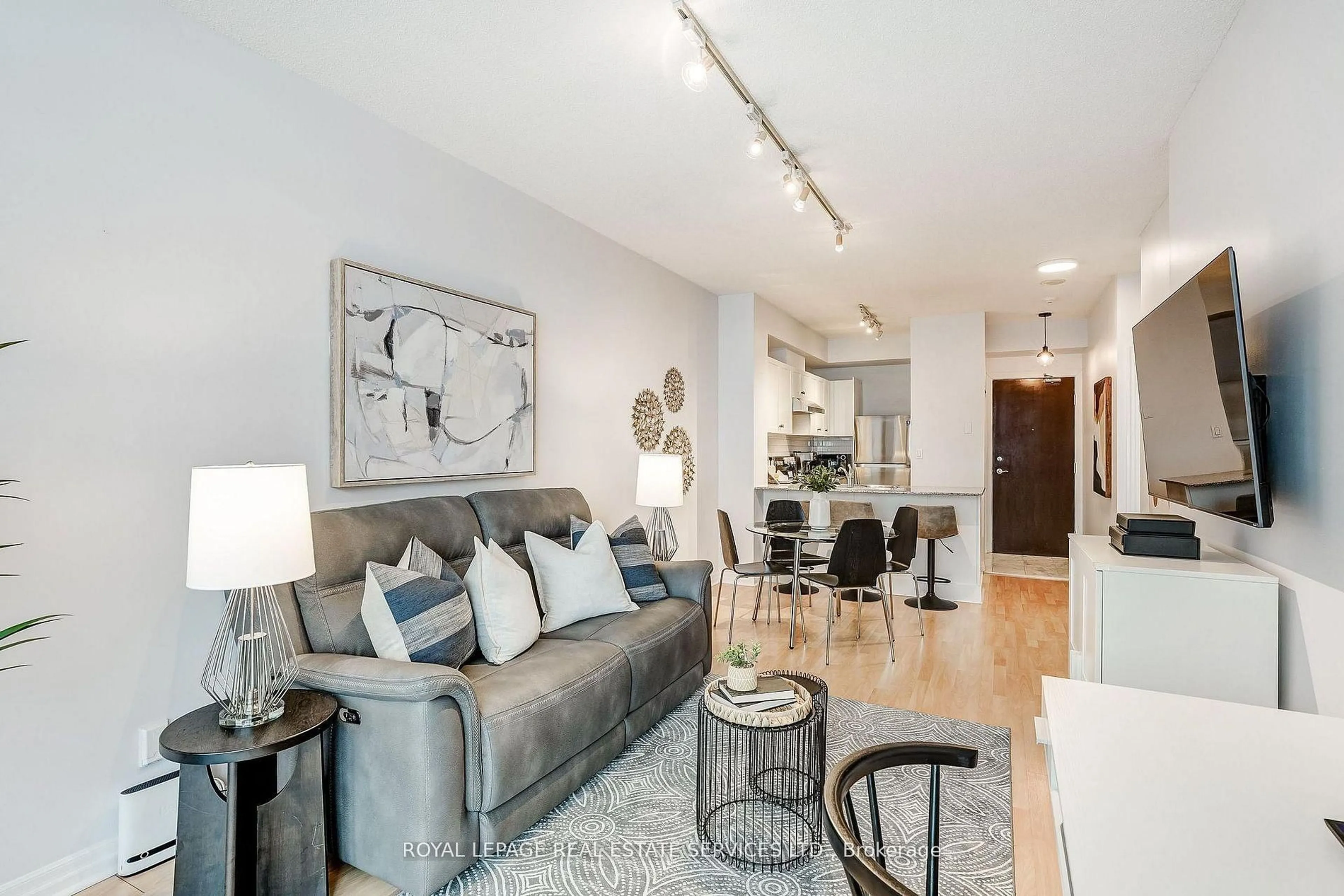 Living room with furniture, unknown for 1359 Rathburn Rd #1106, Mississauga Ontario L4W 5P7