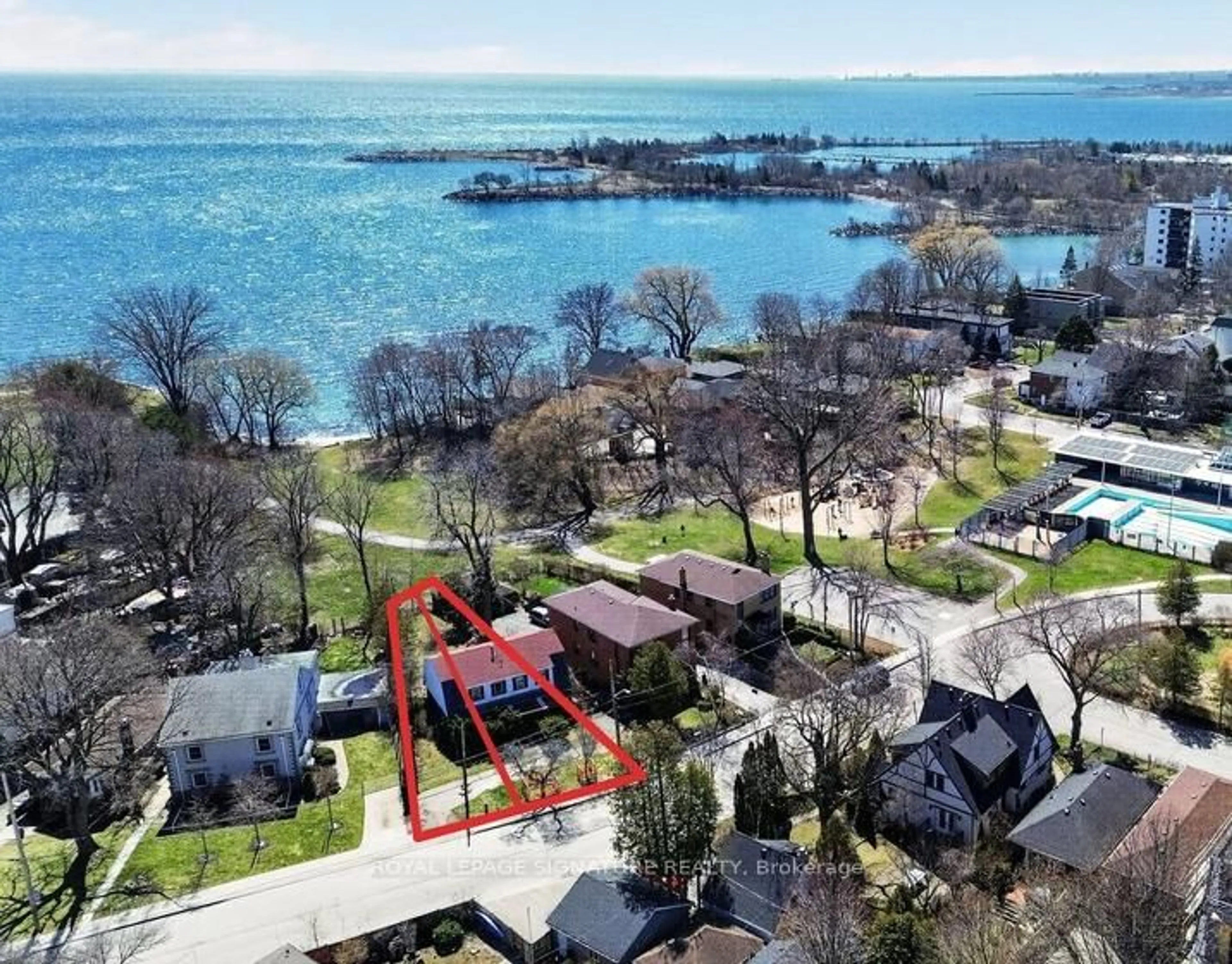 A pic from outside/outdoor area/front of a property/back of a property/a pic from drone, water/lake/river/ocean view for 175 Lake Shore Dr, Toronto Ontario M8V 2A1