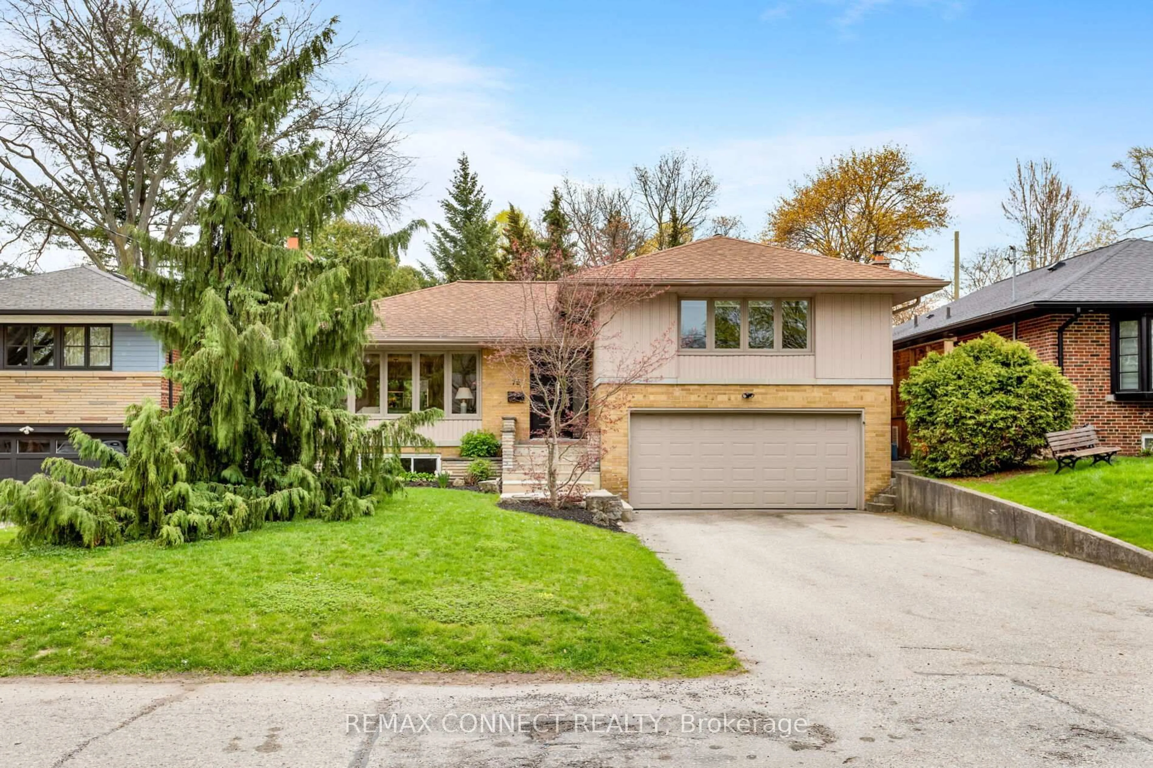 Home with brick exterior material, street for 75 Glenellen Dr, Toronto Ontario M8Y 2H2
