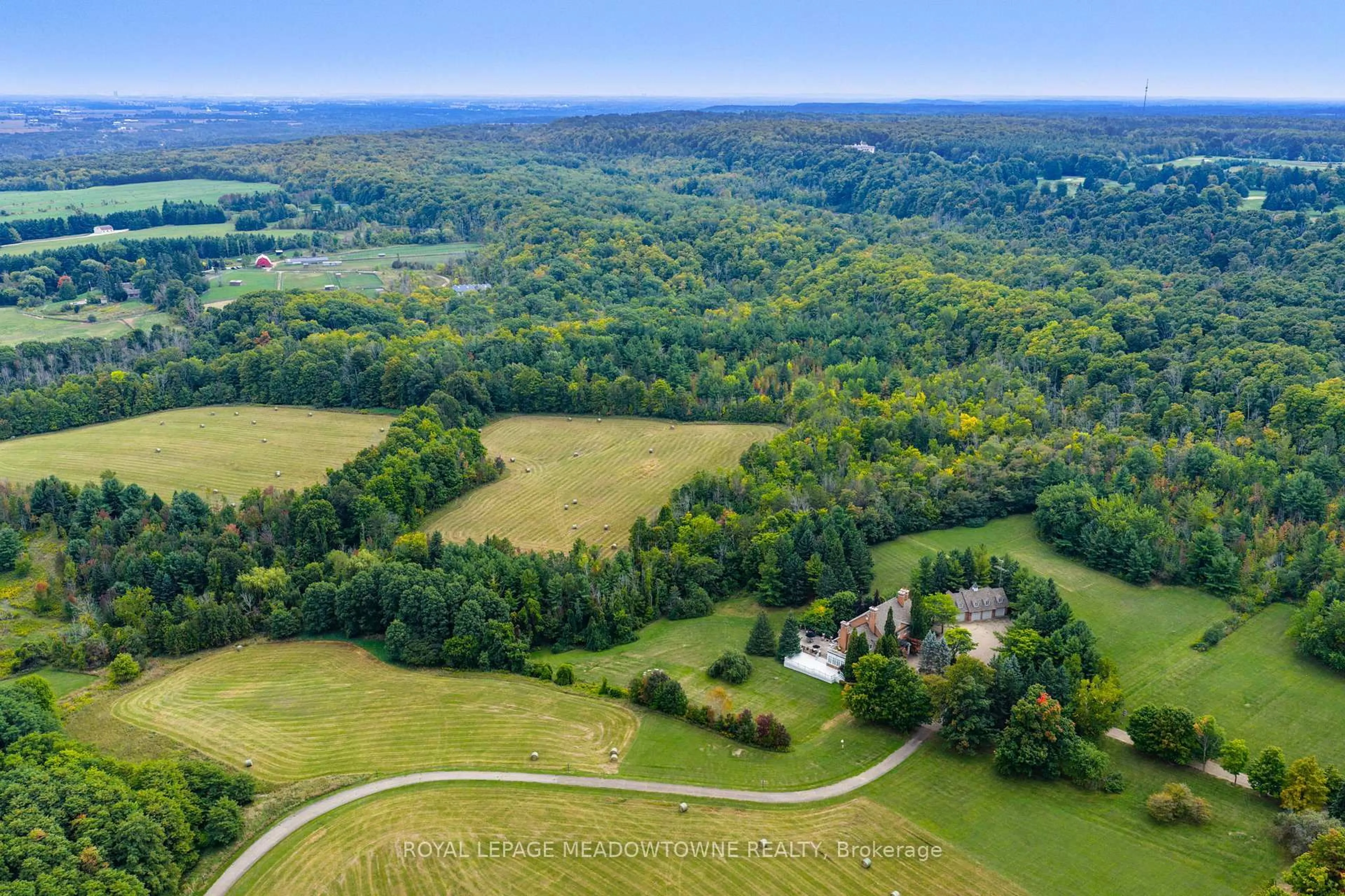 A pic from outside/outdoor area/front of a property/back of a property/a pic from drone, mountain view for 2097 Grange Side Rd, Caledon Ontario L7C 0E7