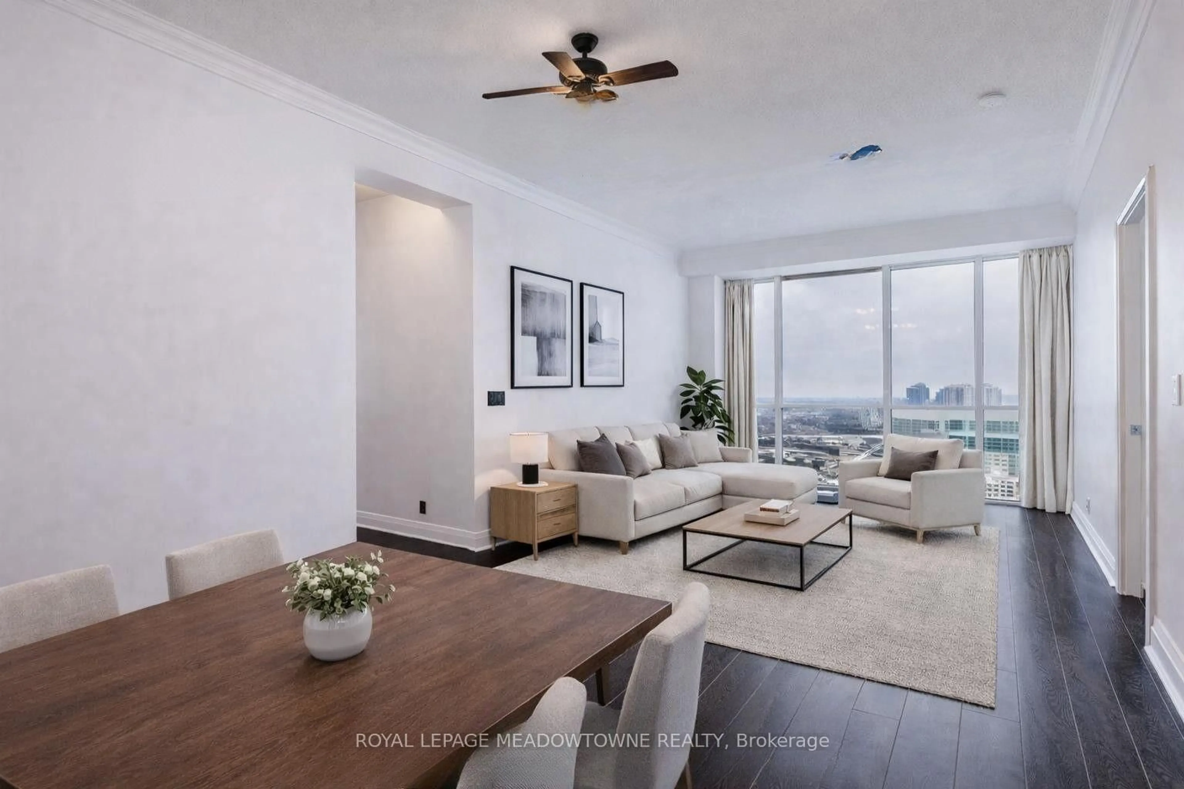 Living room with furniture, unknown for 70 Absolute Ave #2906, Mississauga Ontario L4Z 0A4