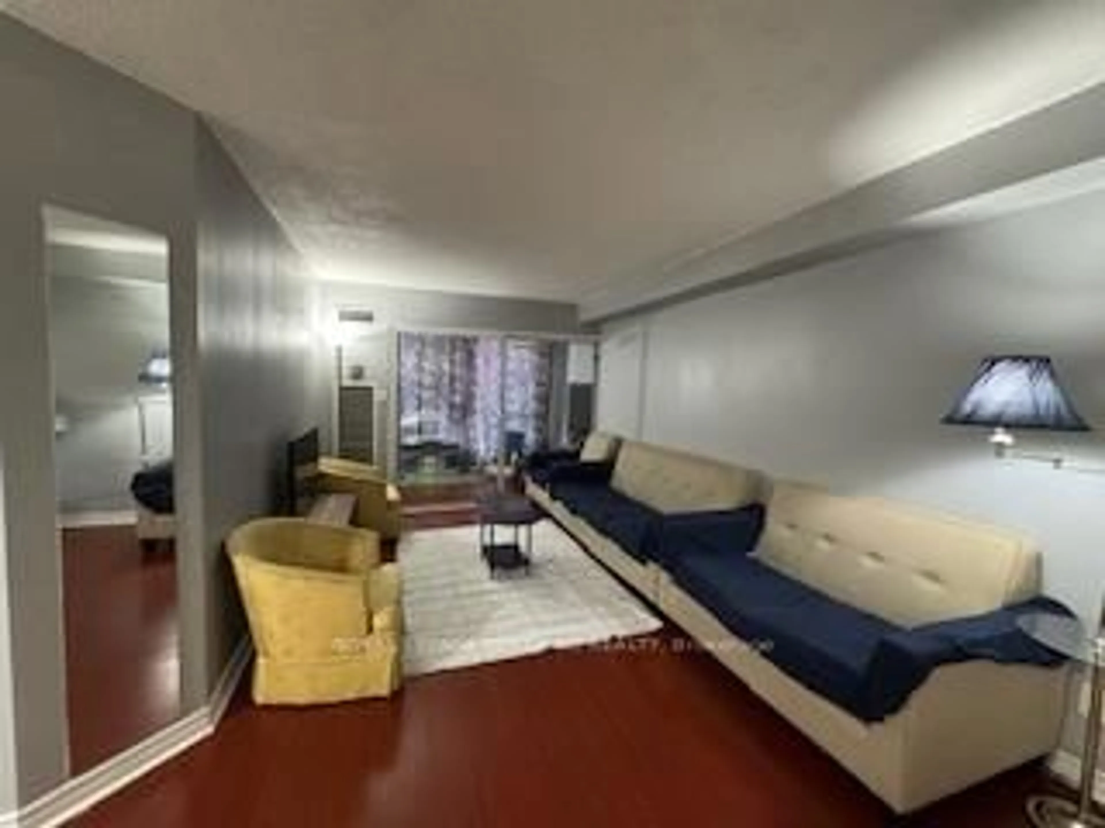 Living room with furniture, unknown for 145 Hillcrest Ave #910, Mississauga Ontario L5B 3Z1