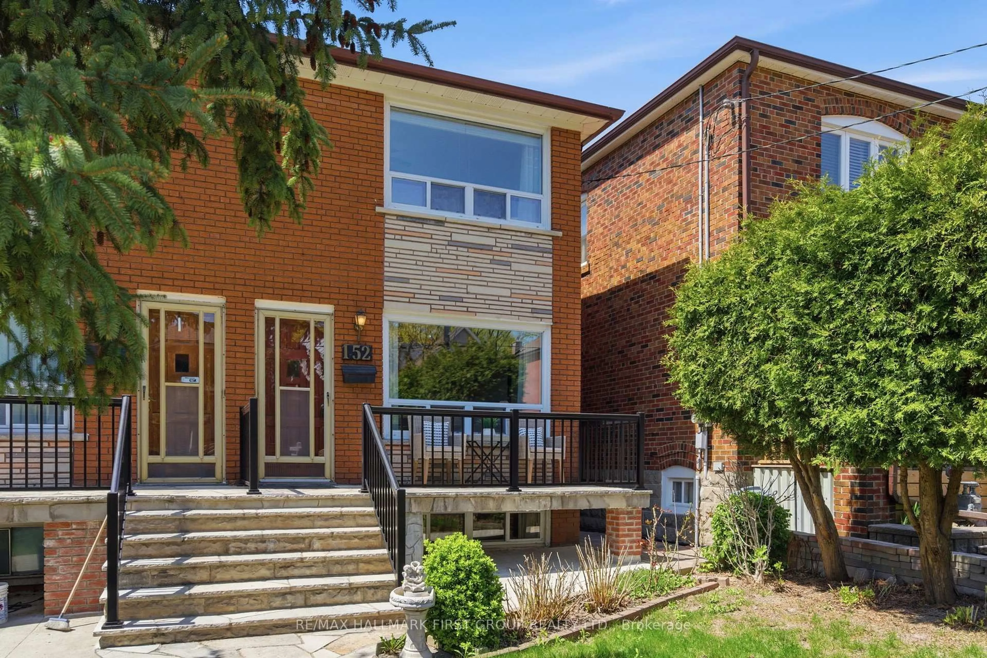 Home with brick exterior material, street for 152 MCROBERTS Ave, Toronto Ontario M6E 4P5