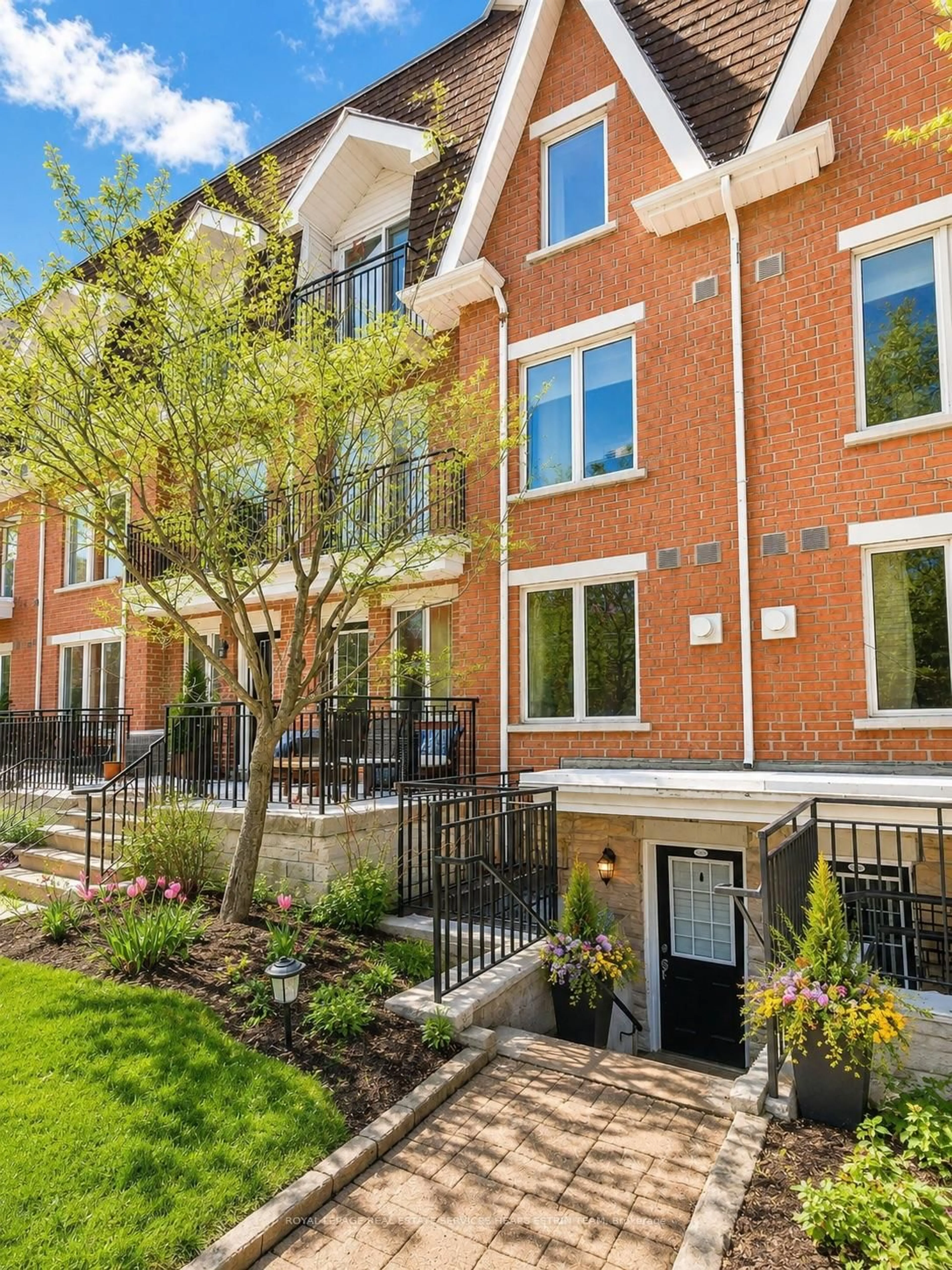 Home with brick exterior material, street for 50 Joe Shuster Way #215, Toronto Ontario M6K 1Y8