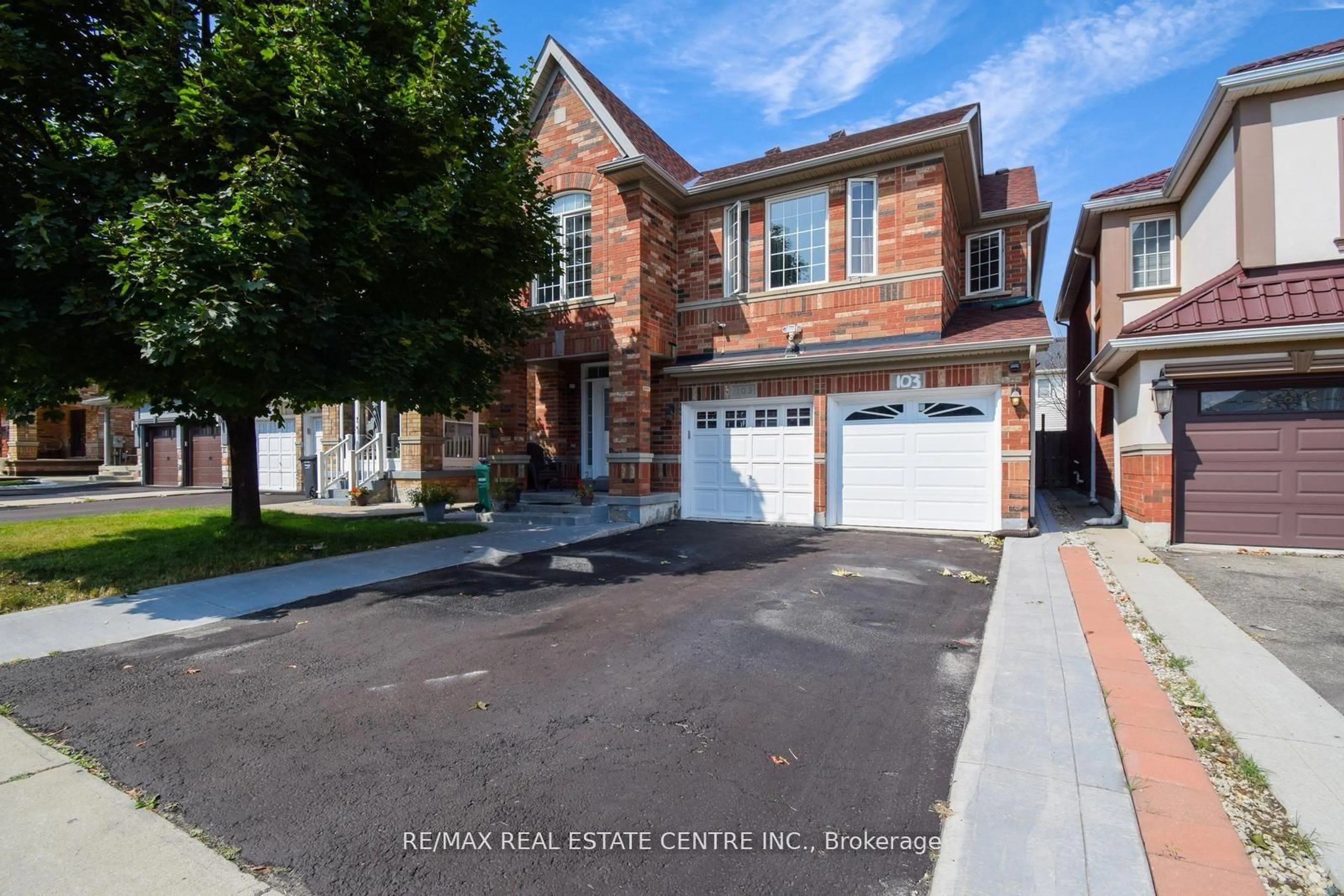 Home with brick exterior material, street for 103 Botavia Downs Dr, Brampton Ontario L7A 3P6
