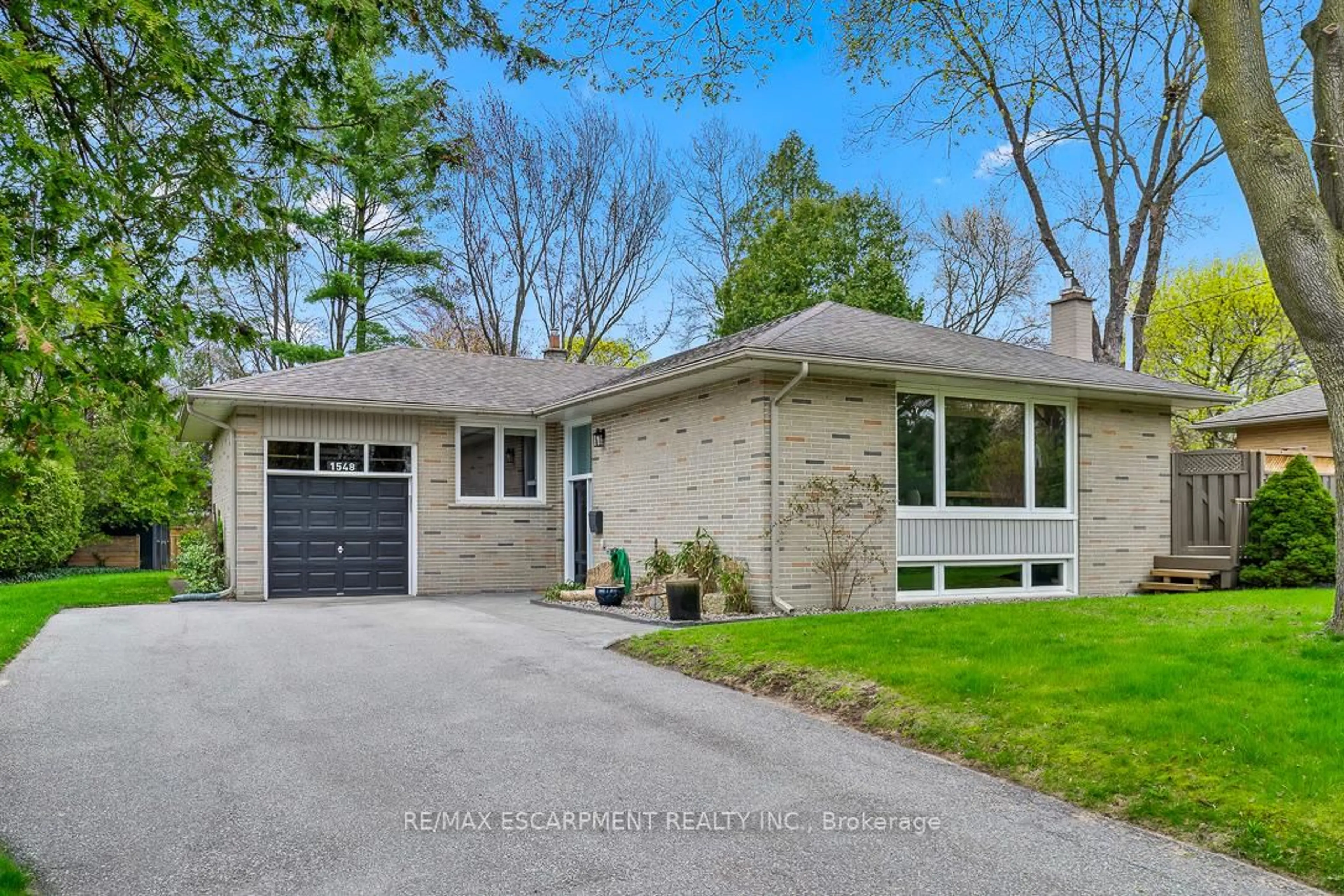 Home with brick exterior material, street for 1548 Wembury Rd, Mississauga Ontario L5J 2L9