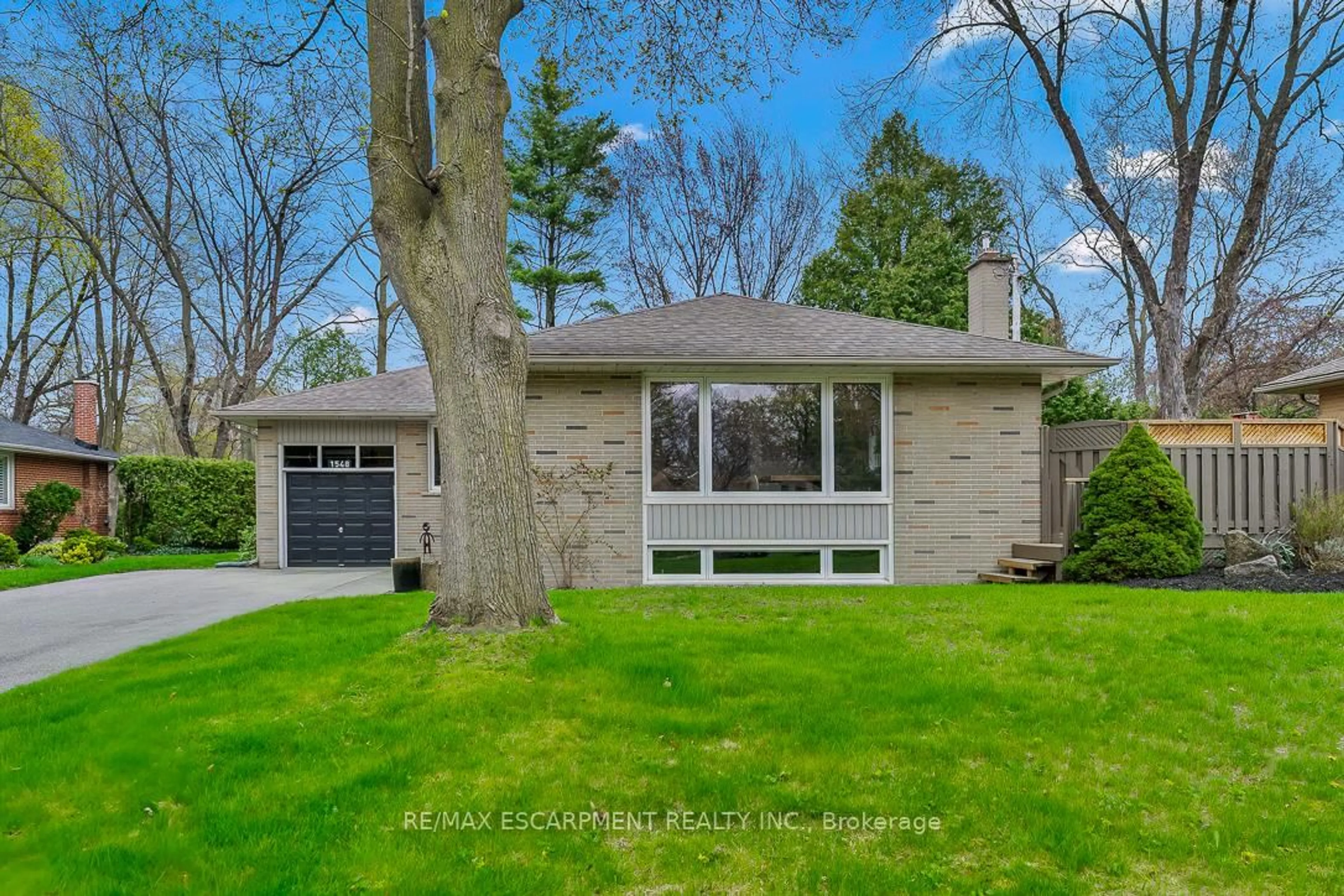 Home with brick exterior material, street for 1548 Wembury Rd, Mississauga Ontario L5J 2L9