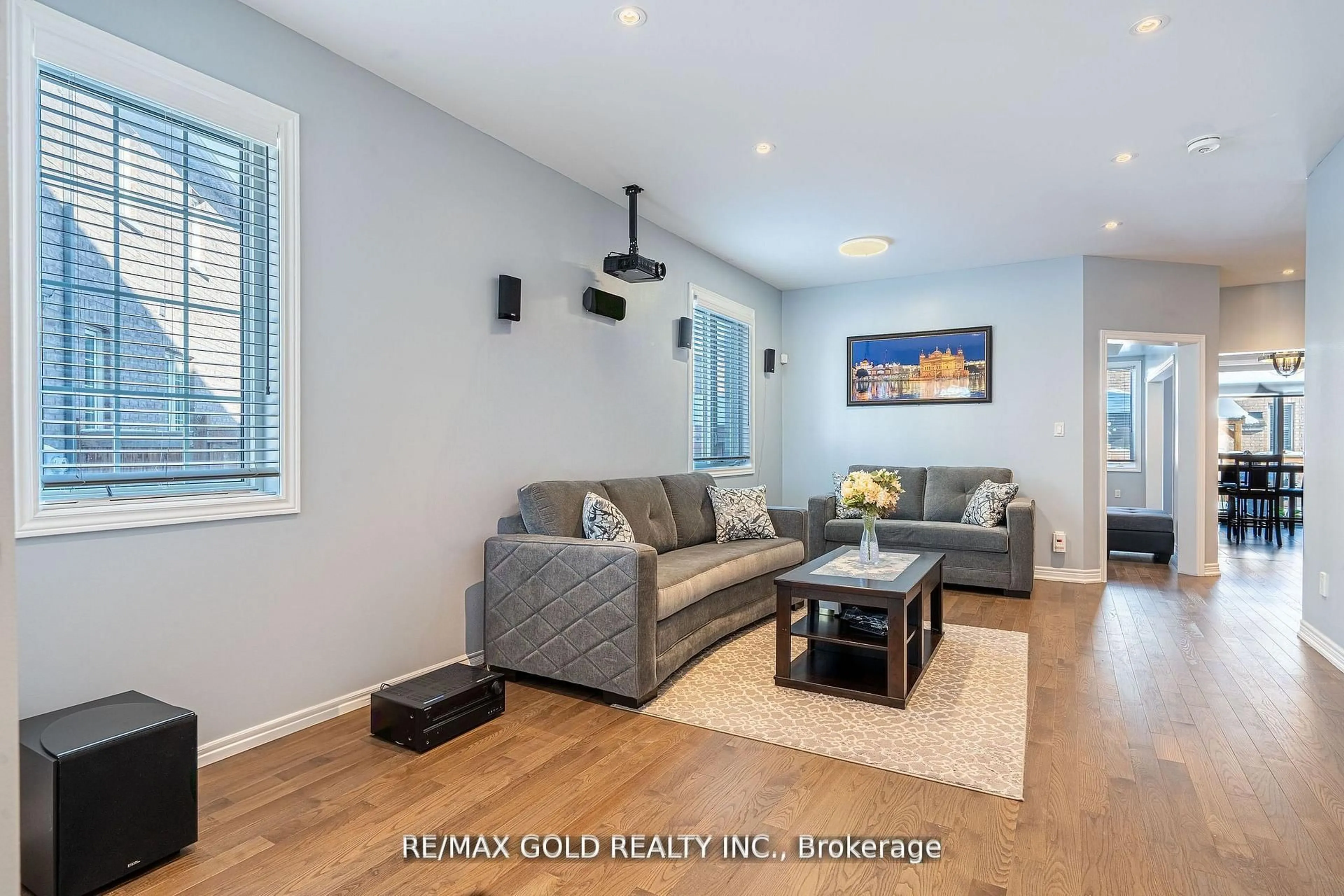 Living room with furniture, wood/laminate floor for 10 Spokanne St, Brampton Ontario L6R 4A2