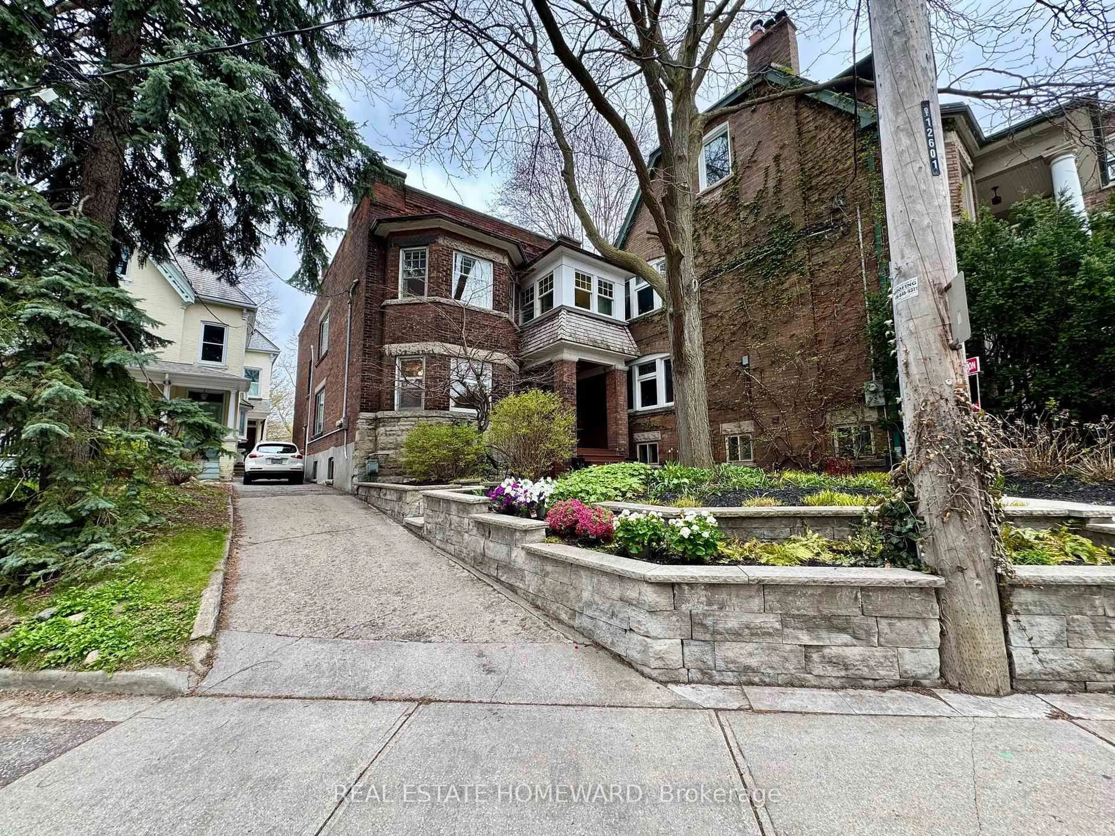 Home with brick exterior material, street for 92 Indian Rd, Toronto Ontario M6R 2V4
