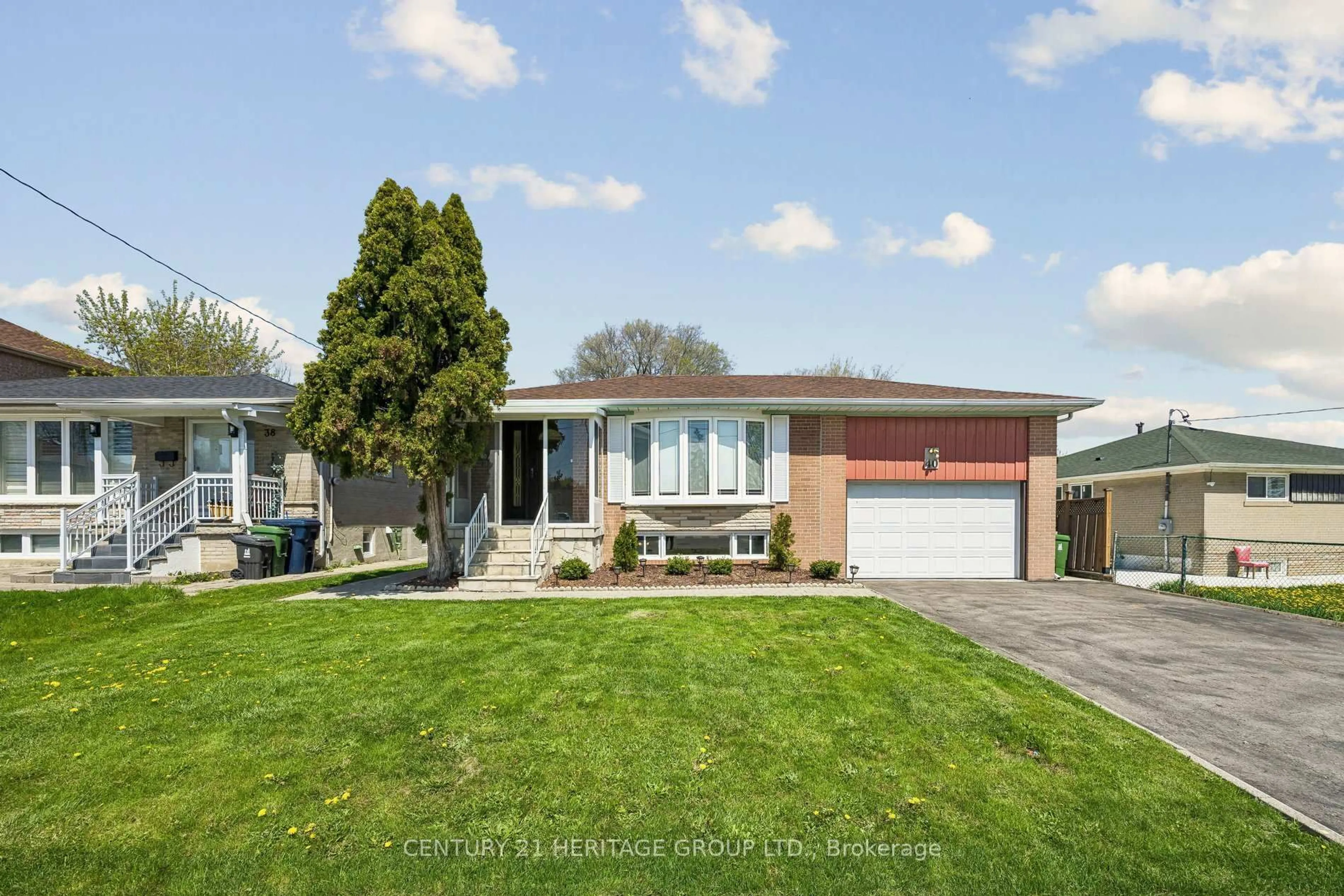Home with brick exterior material, street for 40 Amaron Ave, Toronto Ontario M9V 1Z1