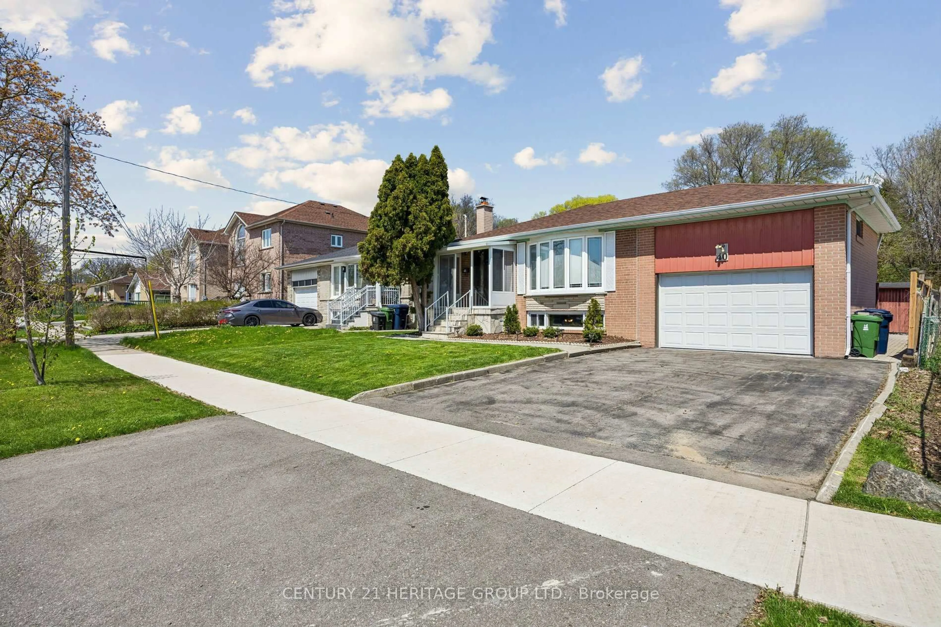 Home with brick exterior material, street for 40 Amaron Ave, Toronto Ontario M9V 1Z1