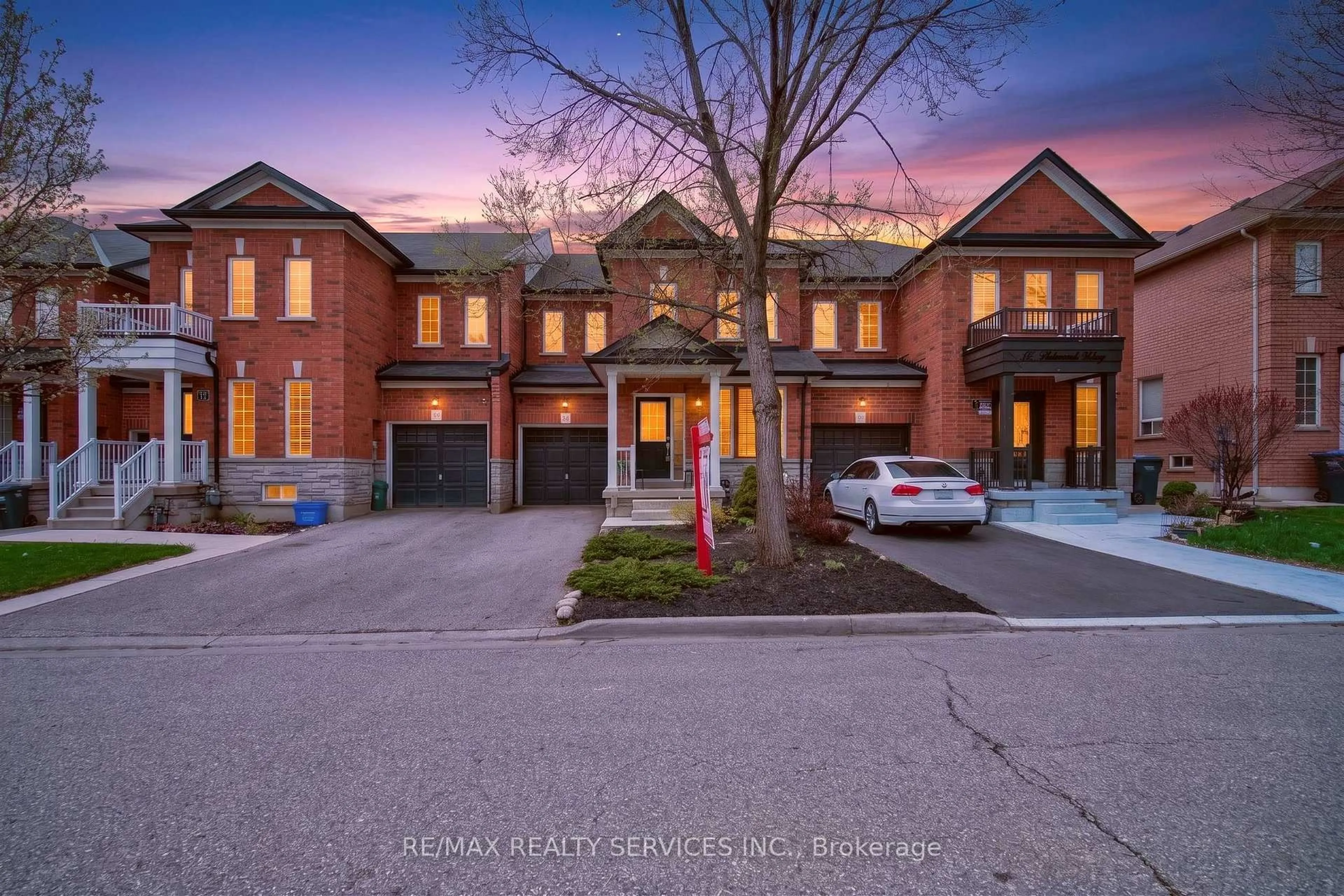 Home with brick exterior material, street for 12 Nutwood Way, Brampton Ontario L6R 0X7