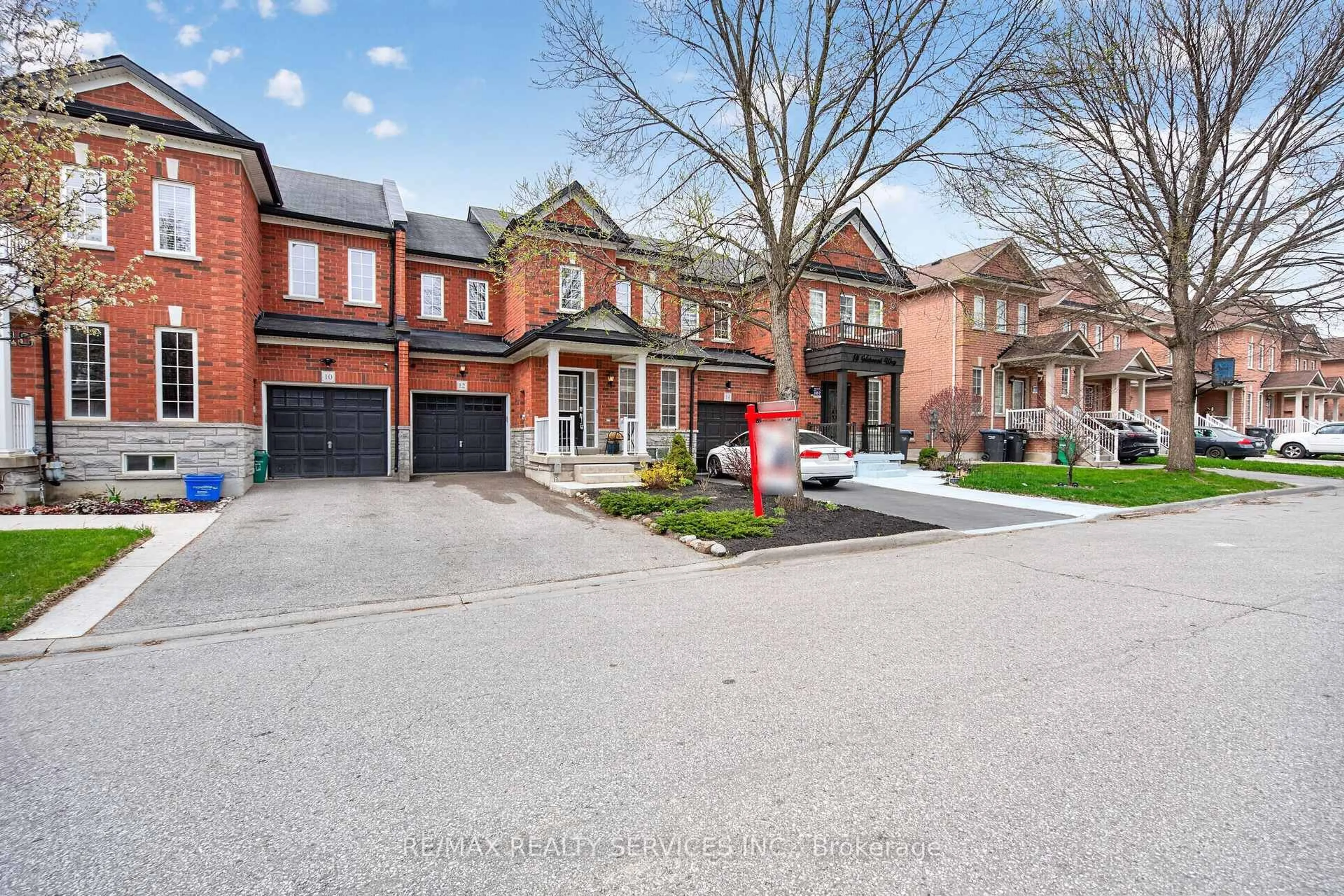 Home with brick exterior material, street for 12 Nutwood Way, Brampton Ontario L6R 0X7