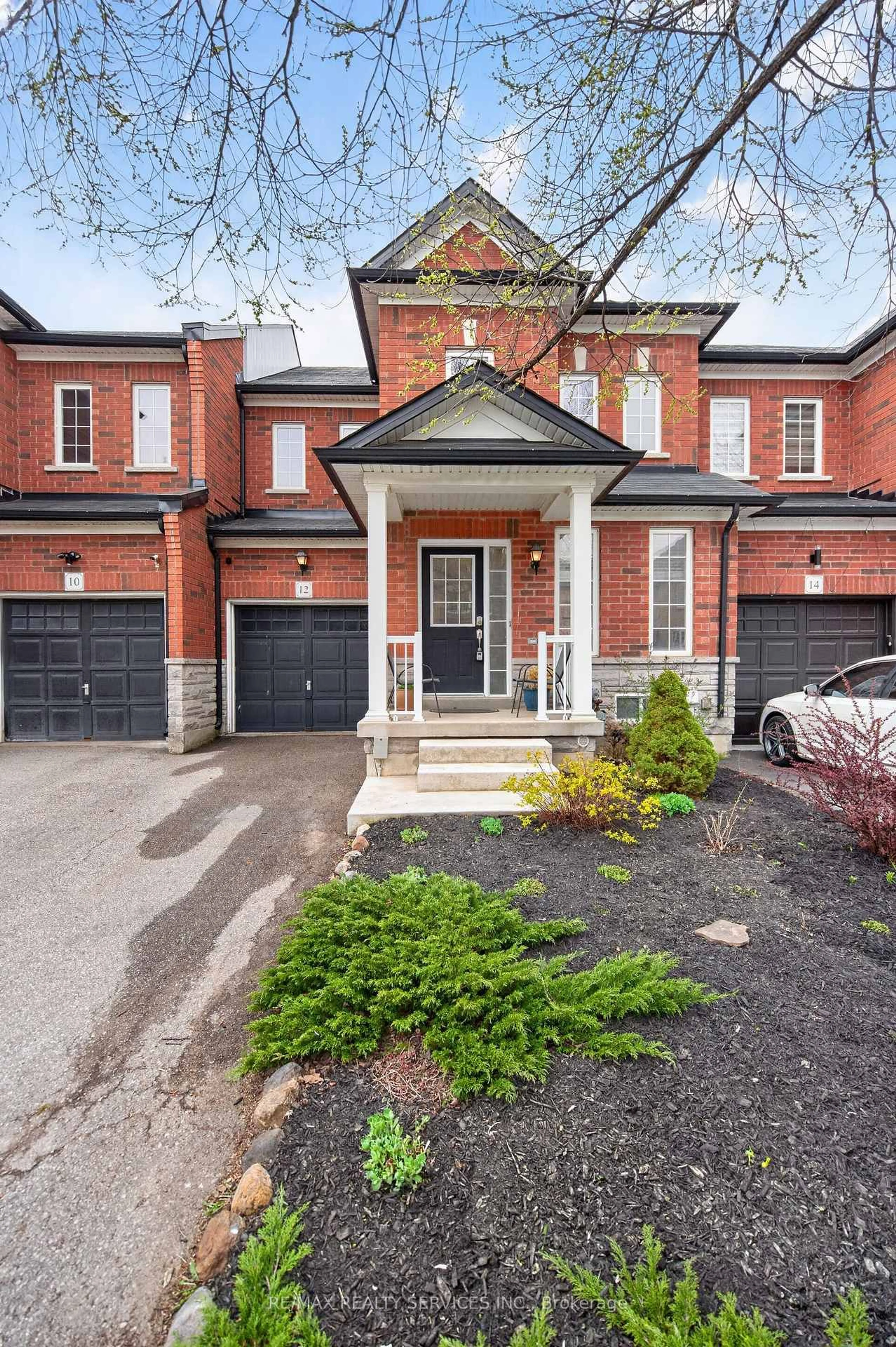 Home with brick exterior material, street for 12 Nutwood Way, Brampton Ontario L6R 0X7