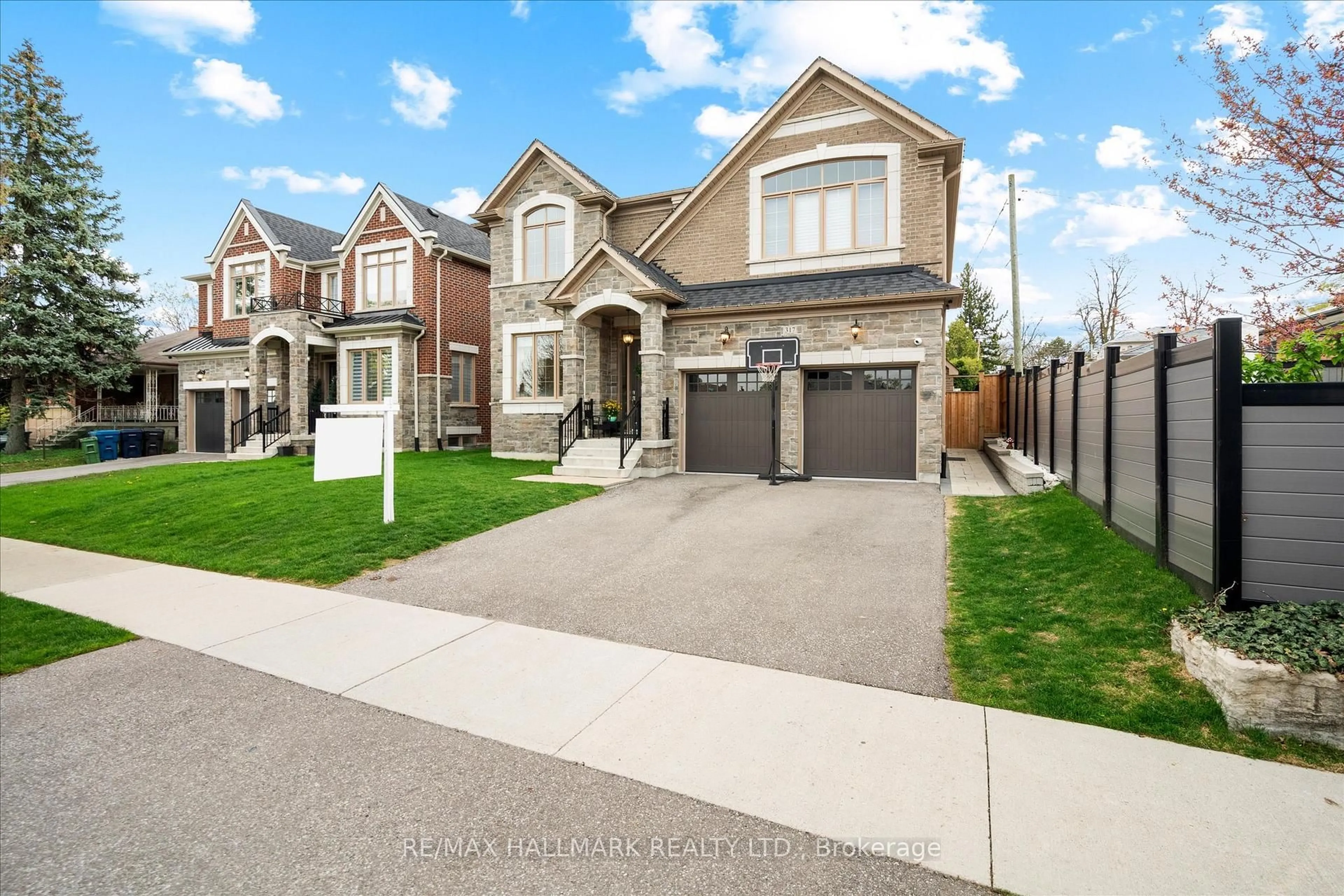Home with brick exterior material, street for 317 La Rose Ave, Toronto Ontario M9P 1B8
