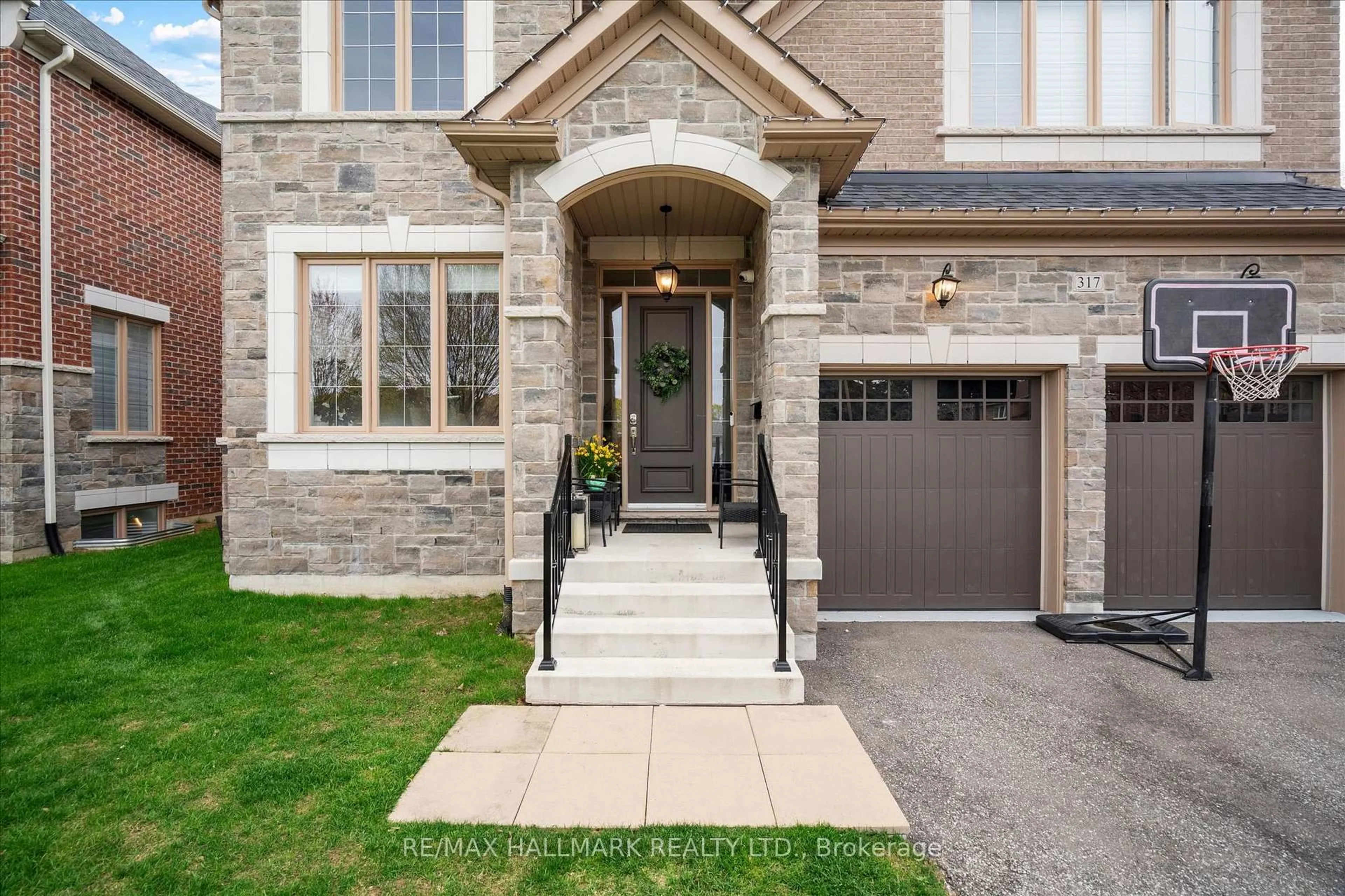 Home with brick exterior material, street for 317 La Rose Ave, Toronto Ontario M9P 1B8