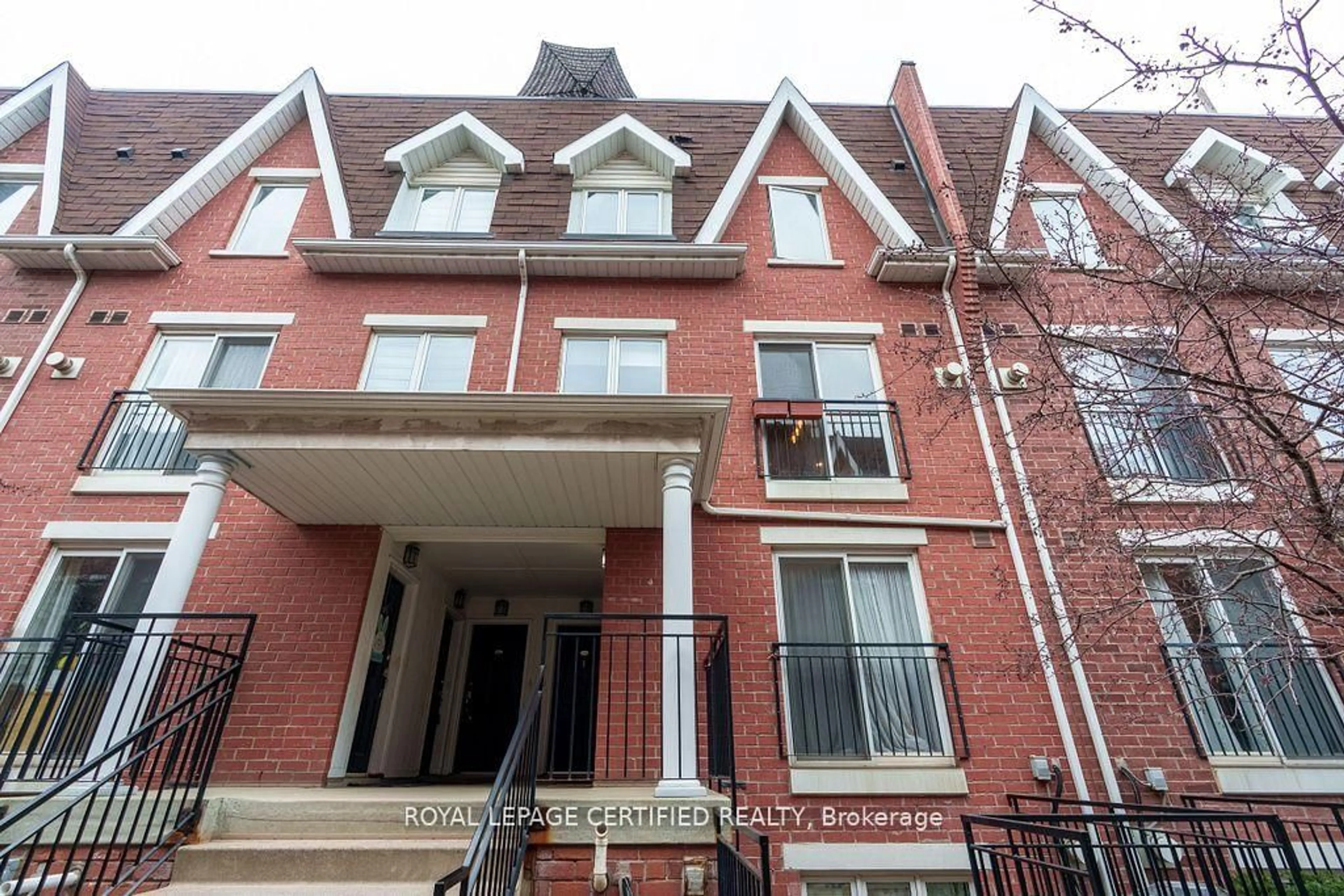 Home with brick exterior material, street for 22 Laidlaw St #1222, Toronto Ontario M6K 1X2