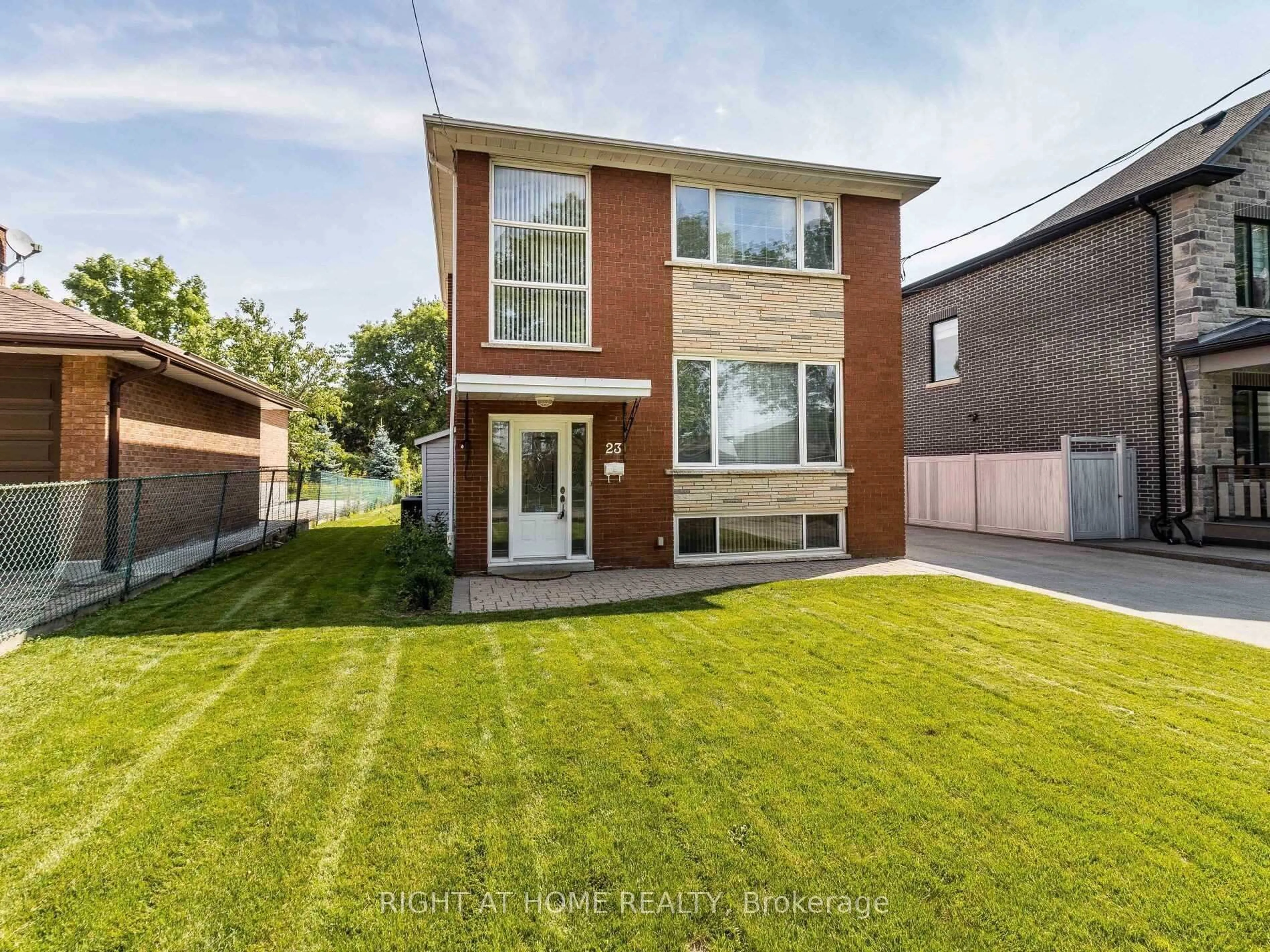Home with brick exterior material, street for 23 Blue Springs Rd, Toronto Ontario M6L 2T5