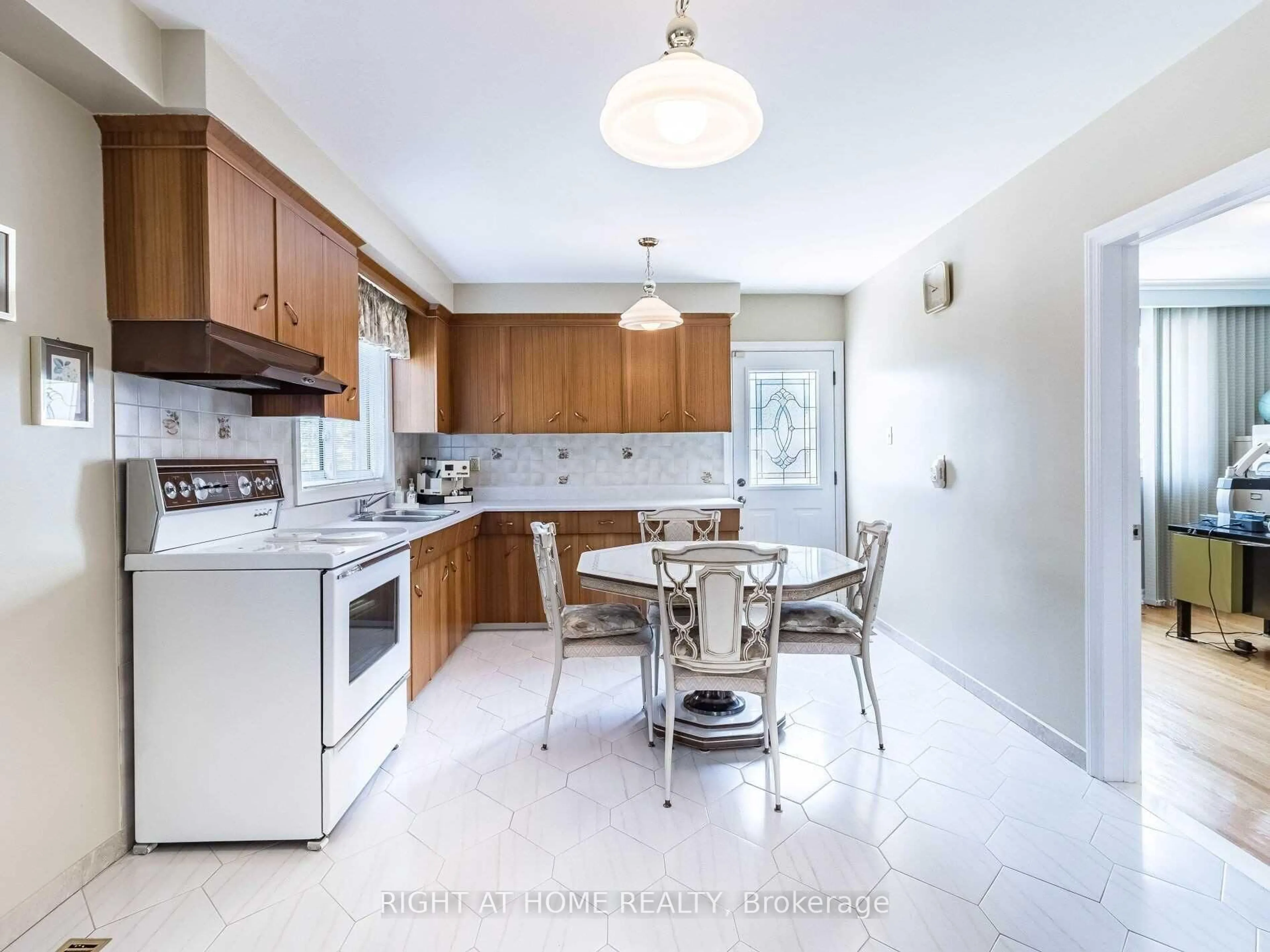Open concept kitchen, ceramic/tile floor for 23 Blue Springs Rd, Toronto Ontario M6L 2T5