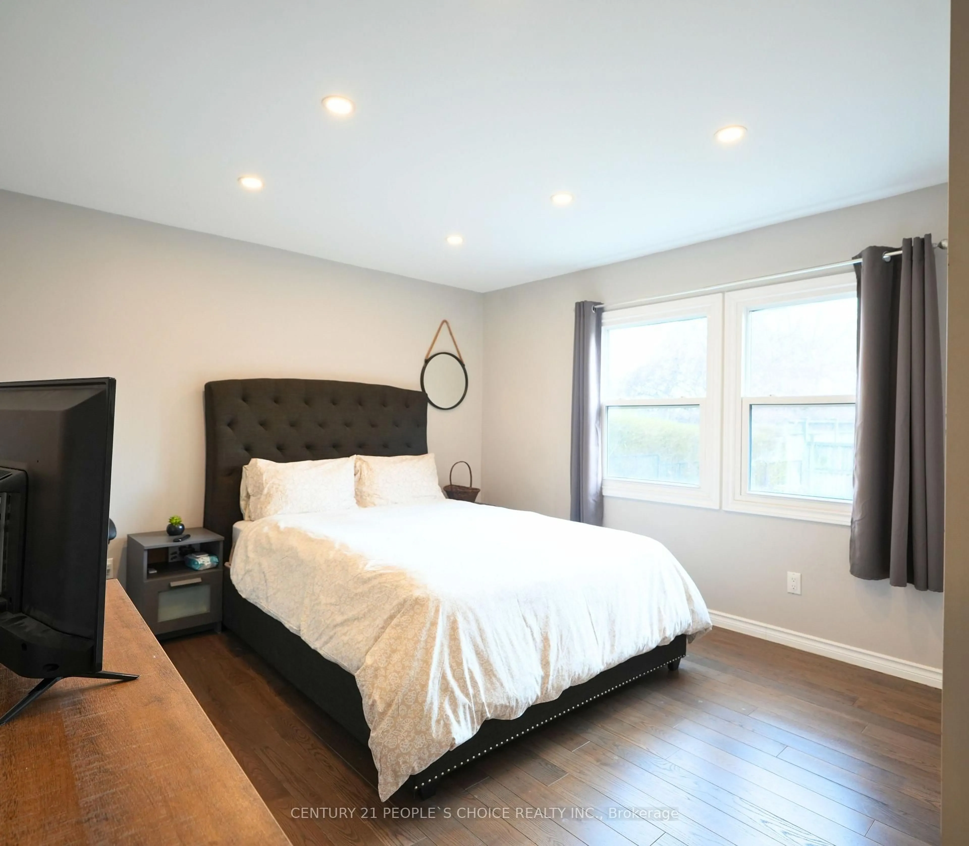 Bedroom with bed, wood/laminate floor for 150 Spears St, Toronto Ontario M6N 3X7