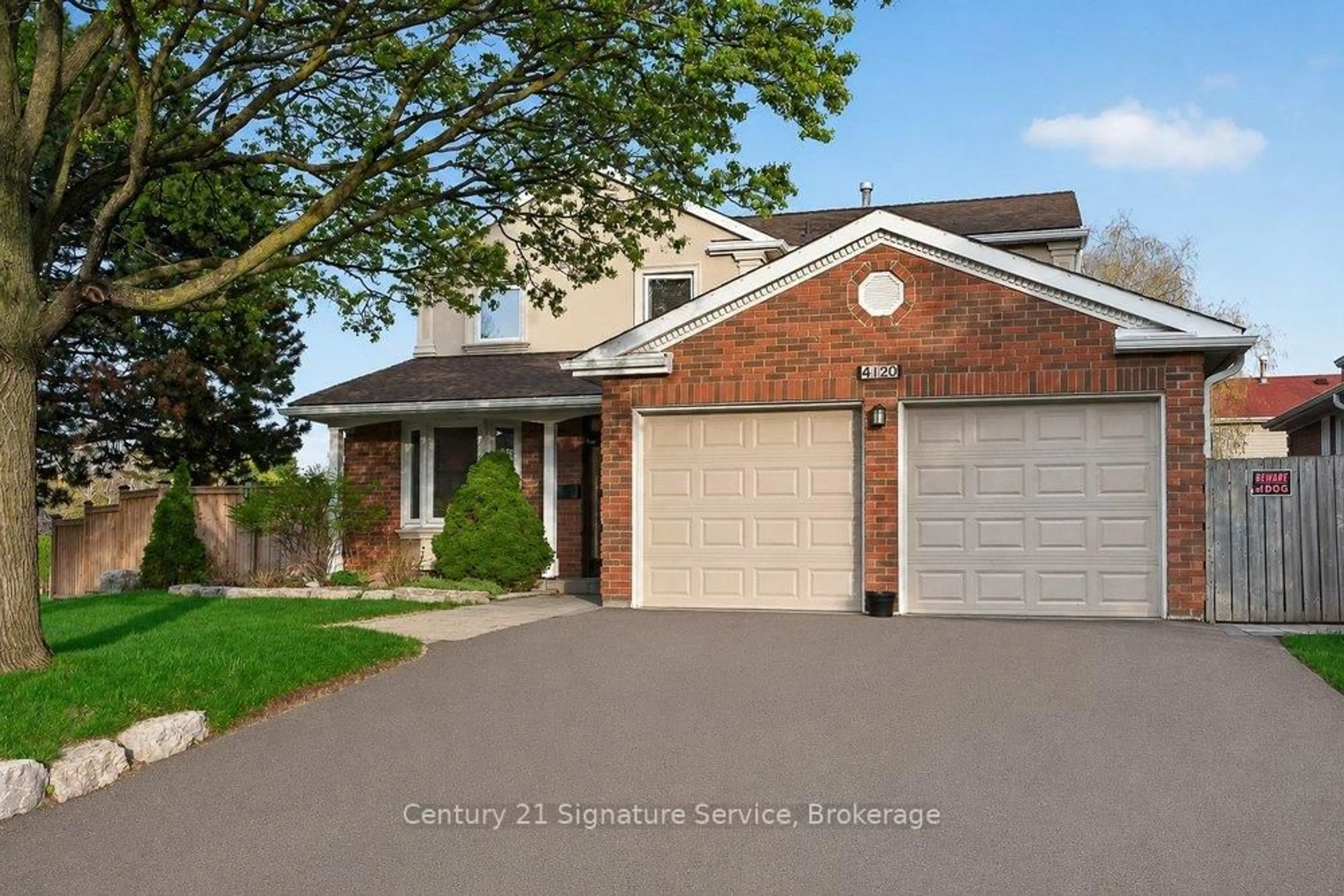 Home with brick exterior material, street for 4120 Rolling Valley Dr, Mississauga Ontario L5L 2K9