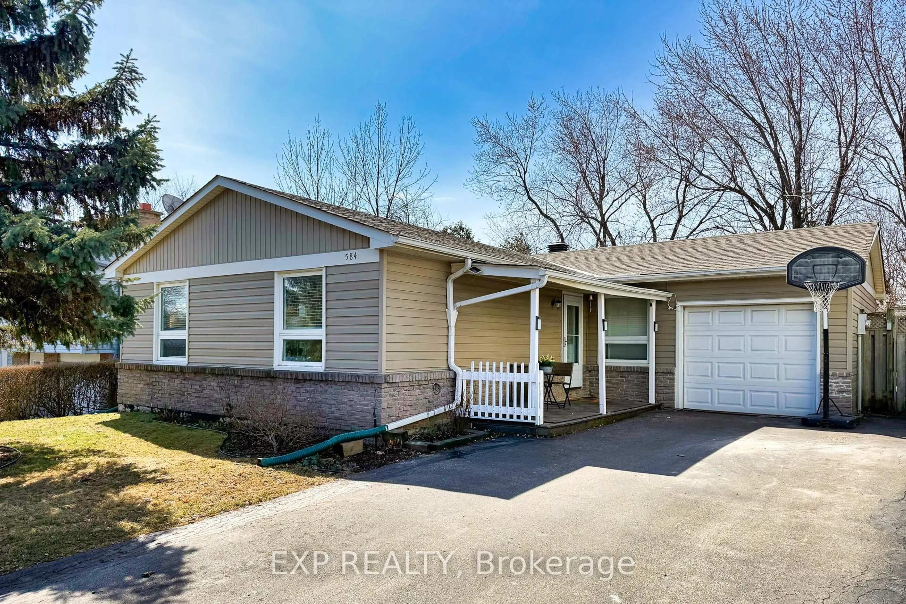 Home with vinyl exterior material, street for 584 Elliott Cres, Milton Ontario L9T 3G4