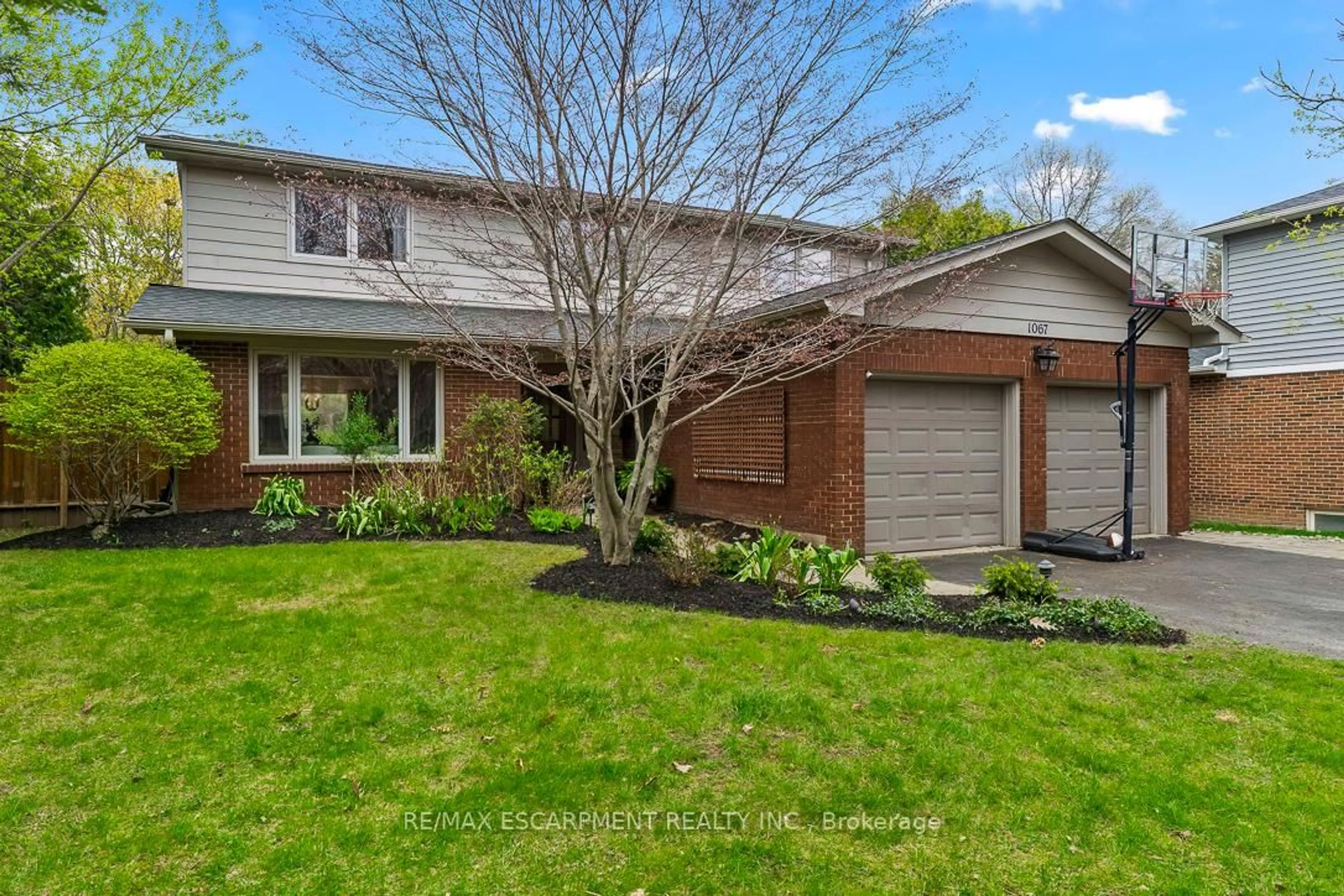 Home with brick exterior material, street for 1067 FAIR BIRCH Dr, Mississauga Ontario L5H 1M4