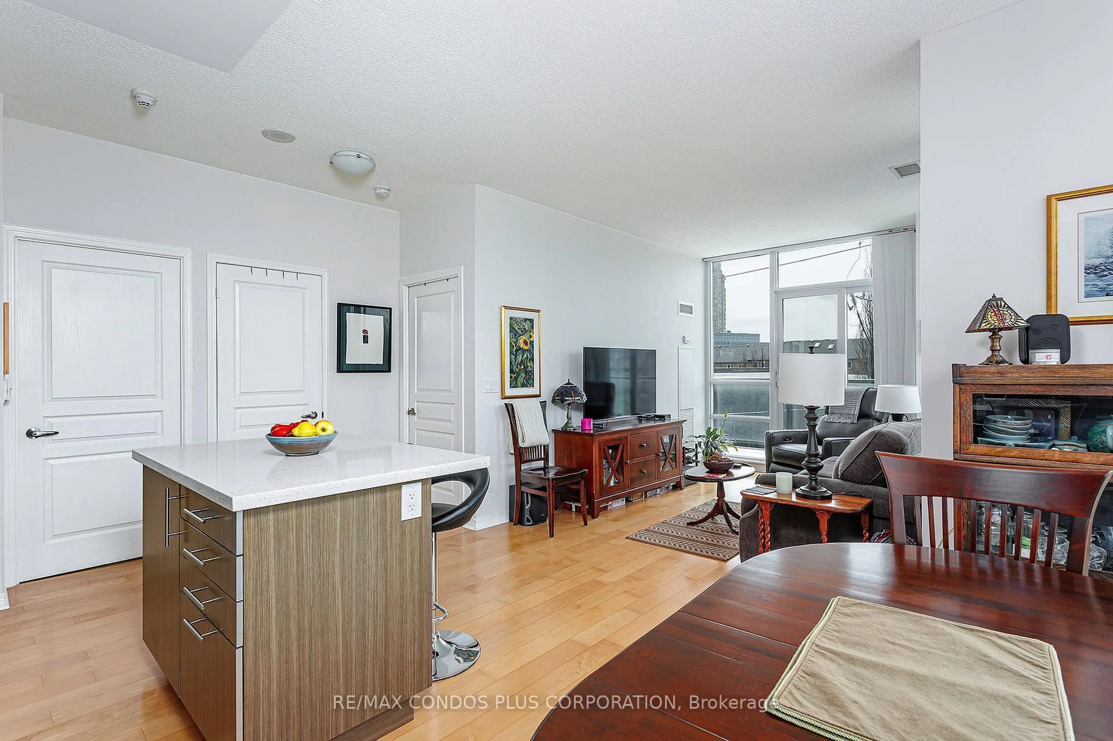 Living room with furniture, unknown for 15 Legion Rd #206, Toronto Ontario M8V 0A9