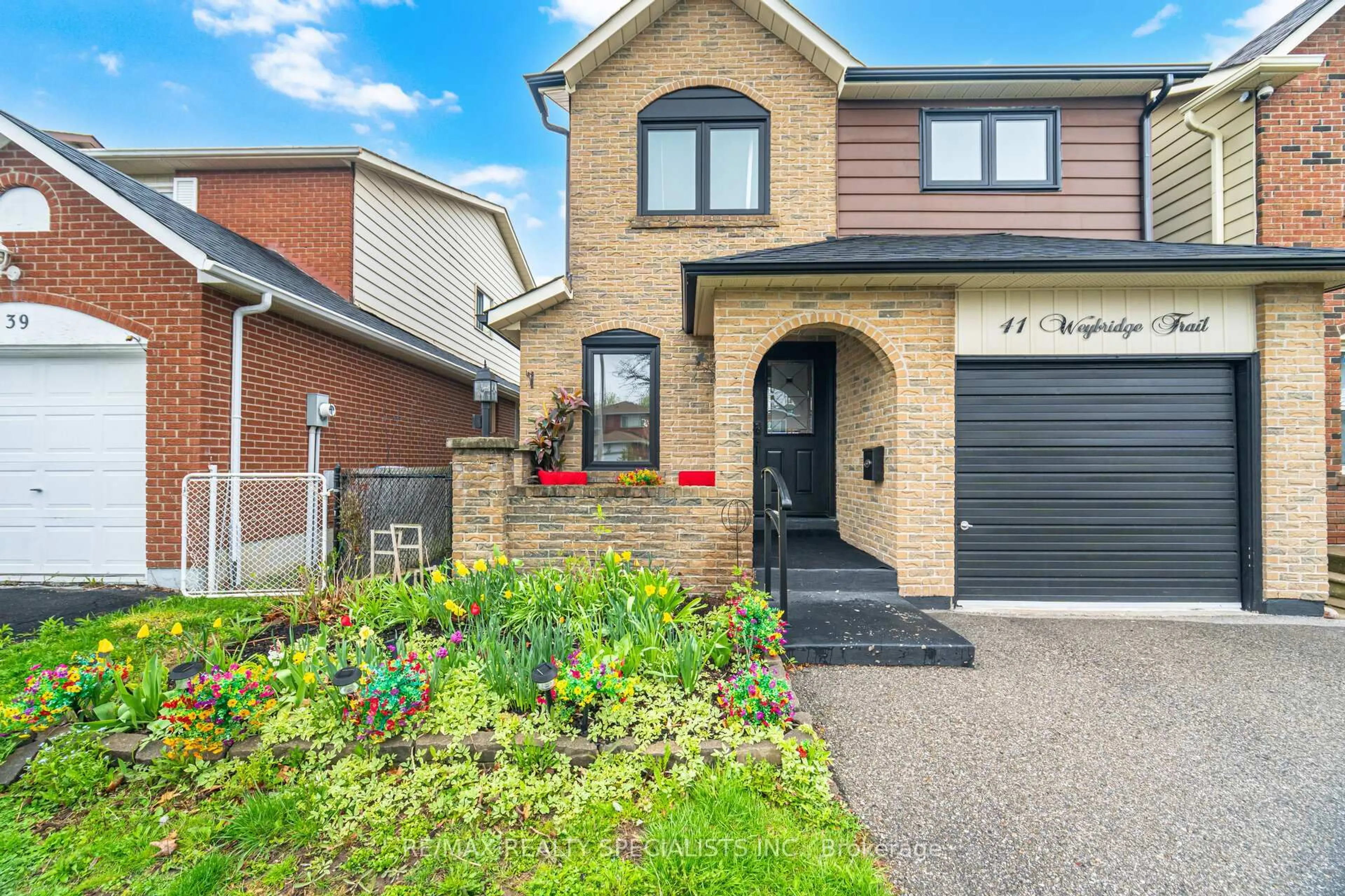 Home with brick exterior material, street for 41 Weybridge Tr, Brampton Ontario L6V 3S3