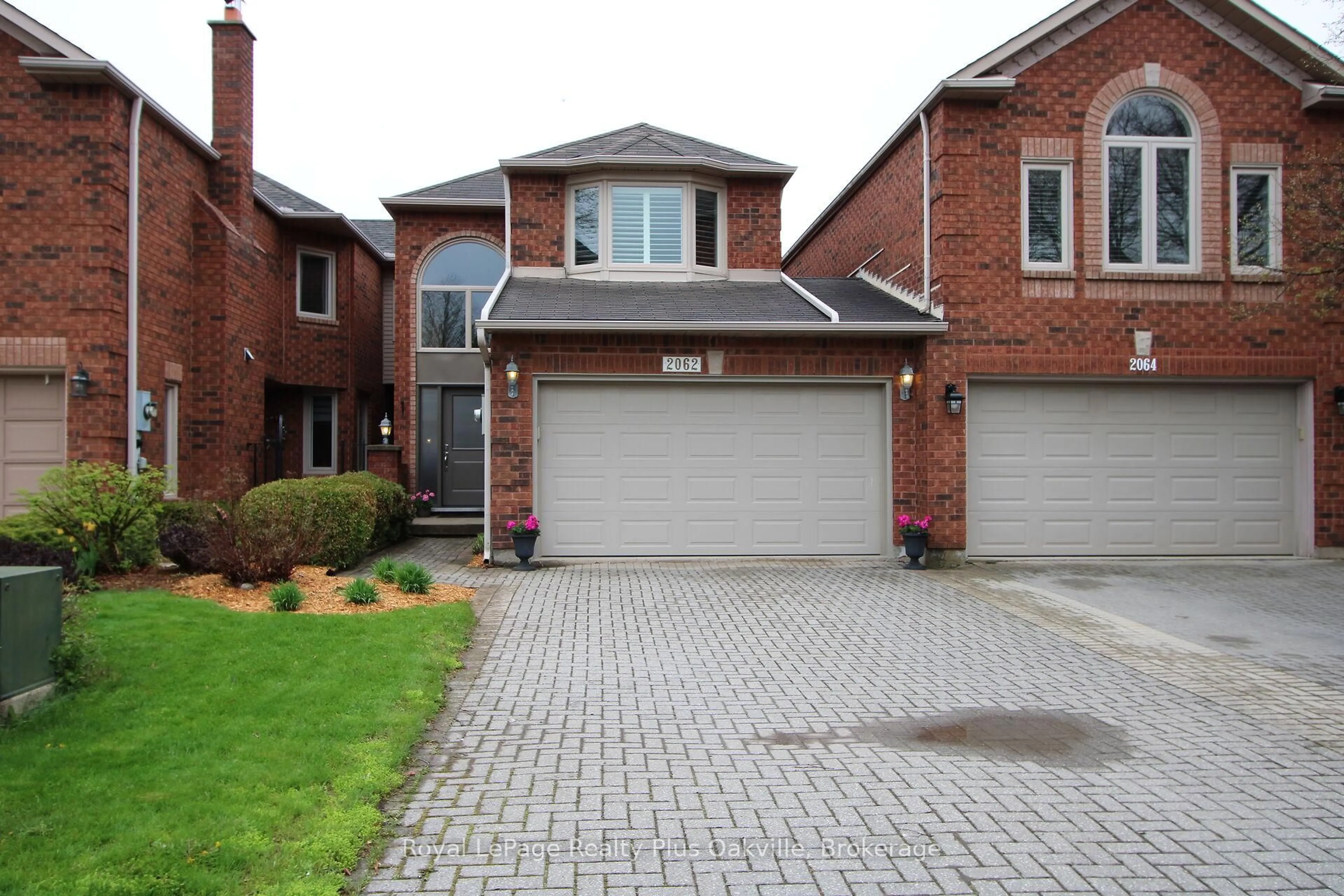 Home with brick exterior material, street for 2062 Brays Lane, Oakville Ontario L6M 2S7