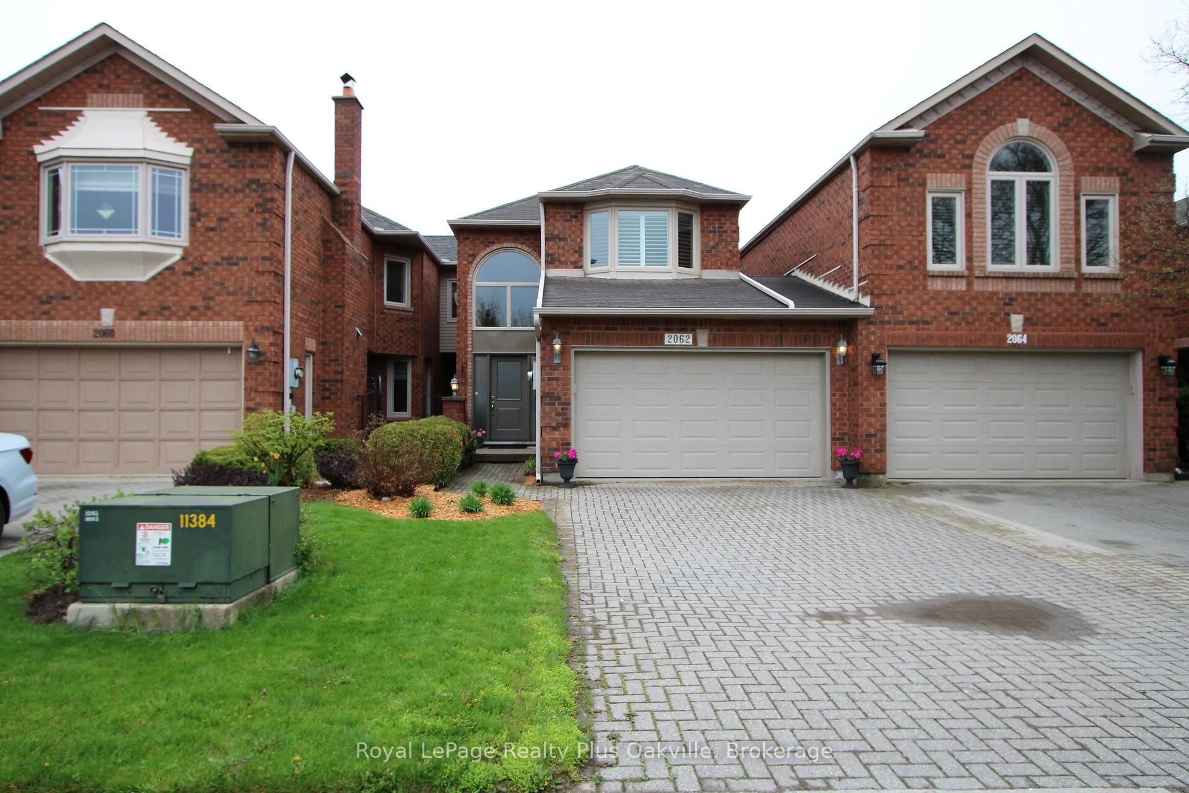 Home with brick exterior material, street for 2062 Brays Lane, Oakville Ontario L6M 2S7