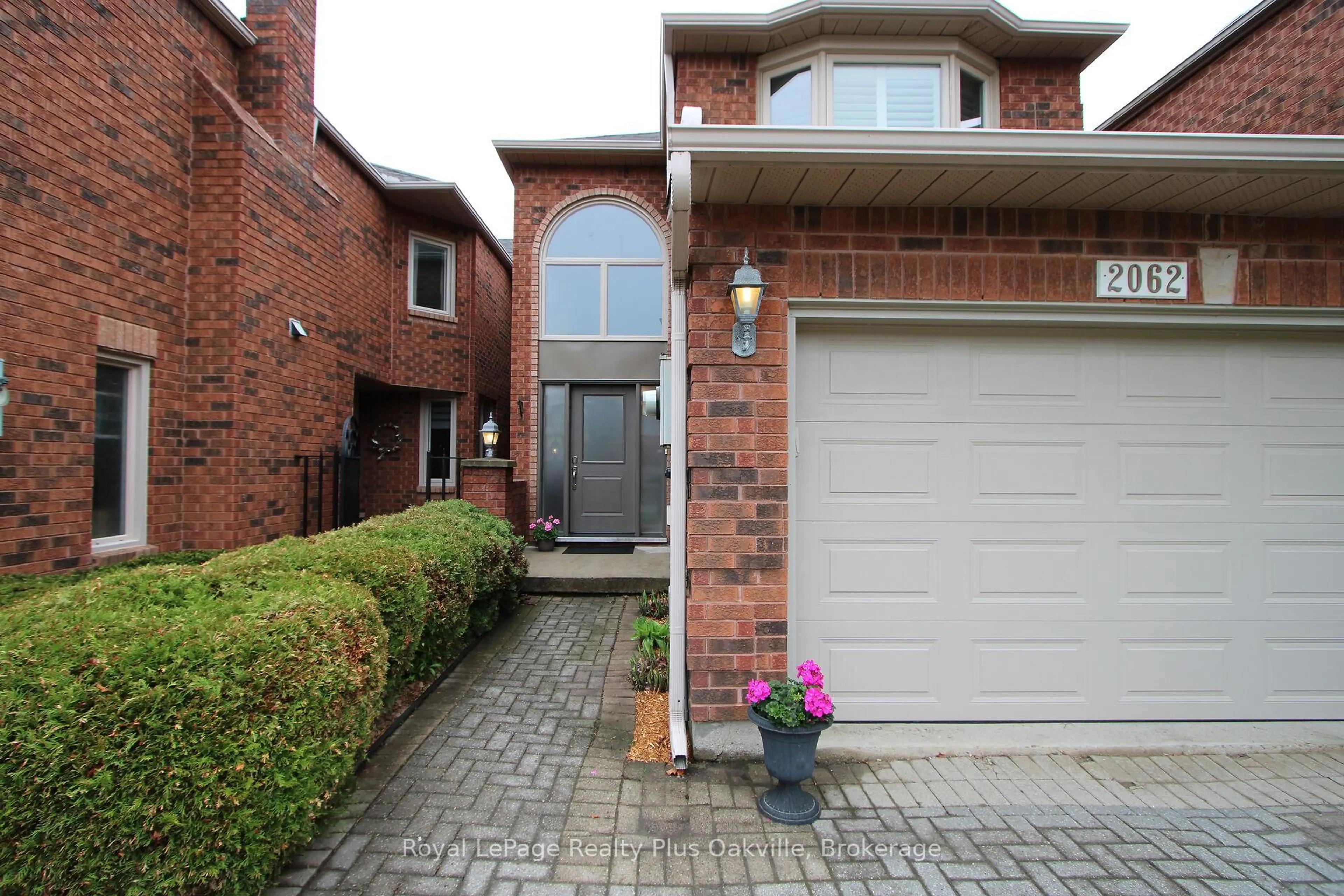 Home with brick exterior material, street for 2062 Brays Lane, Oakville Ontario L6M 2S7