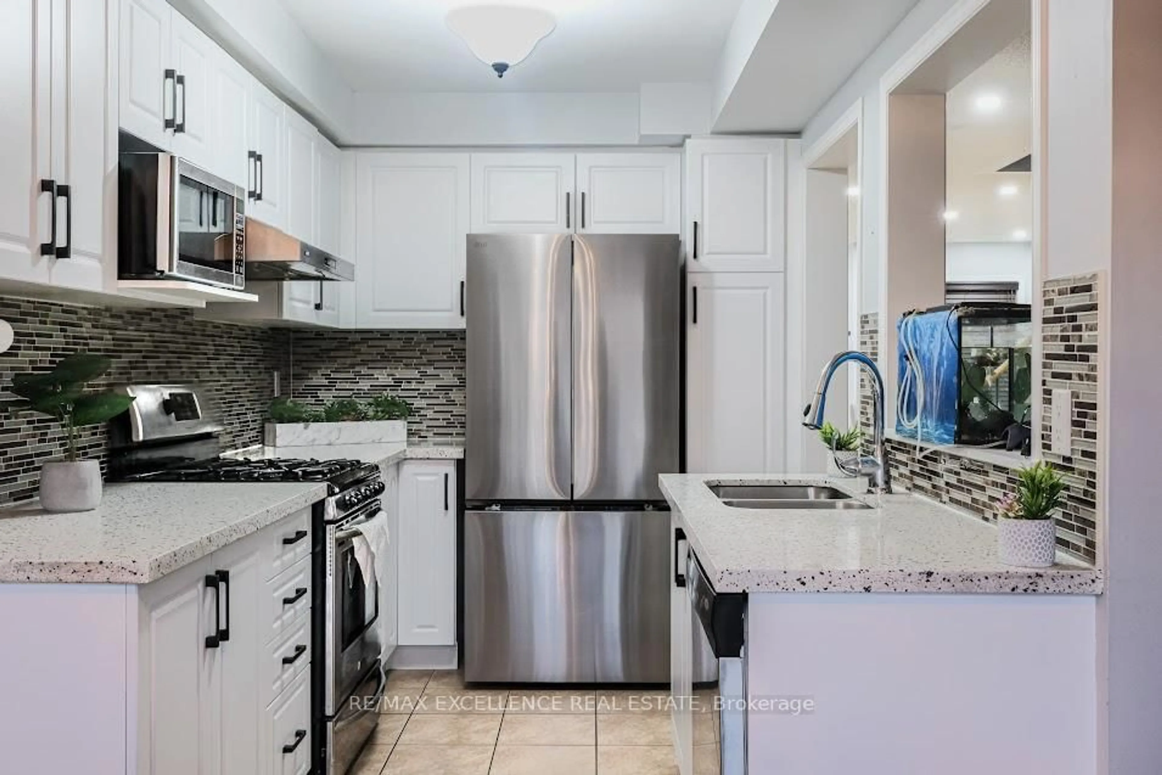Standard kitchen, ceramic/tile floor for 99 Rockgarden Tr, Brampton Ontario L6R 3N1
