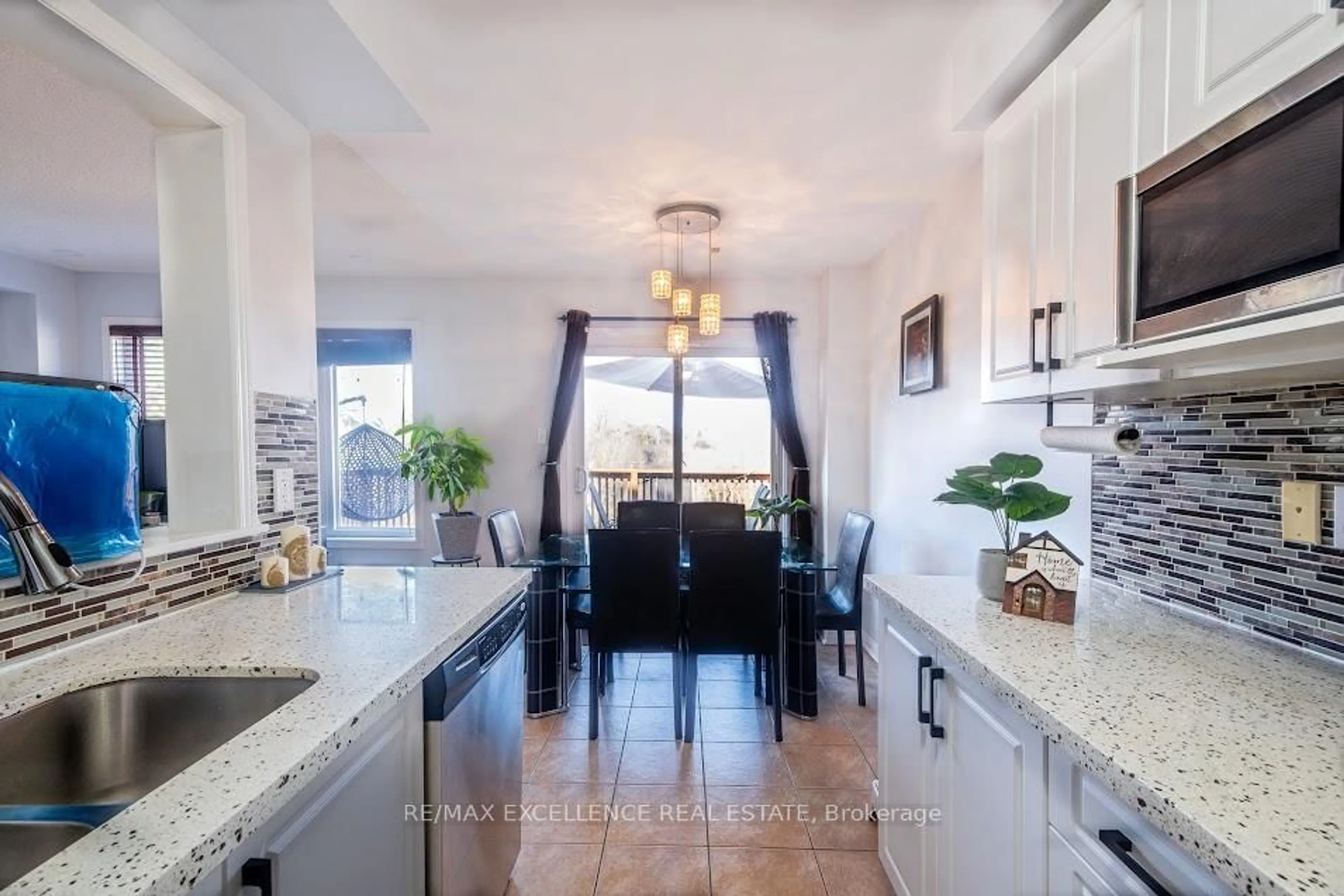 Open concept kitchen, ceramic/tile floor for 99 Rockgarden Tr, Brampton Ontario L6R 3N1