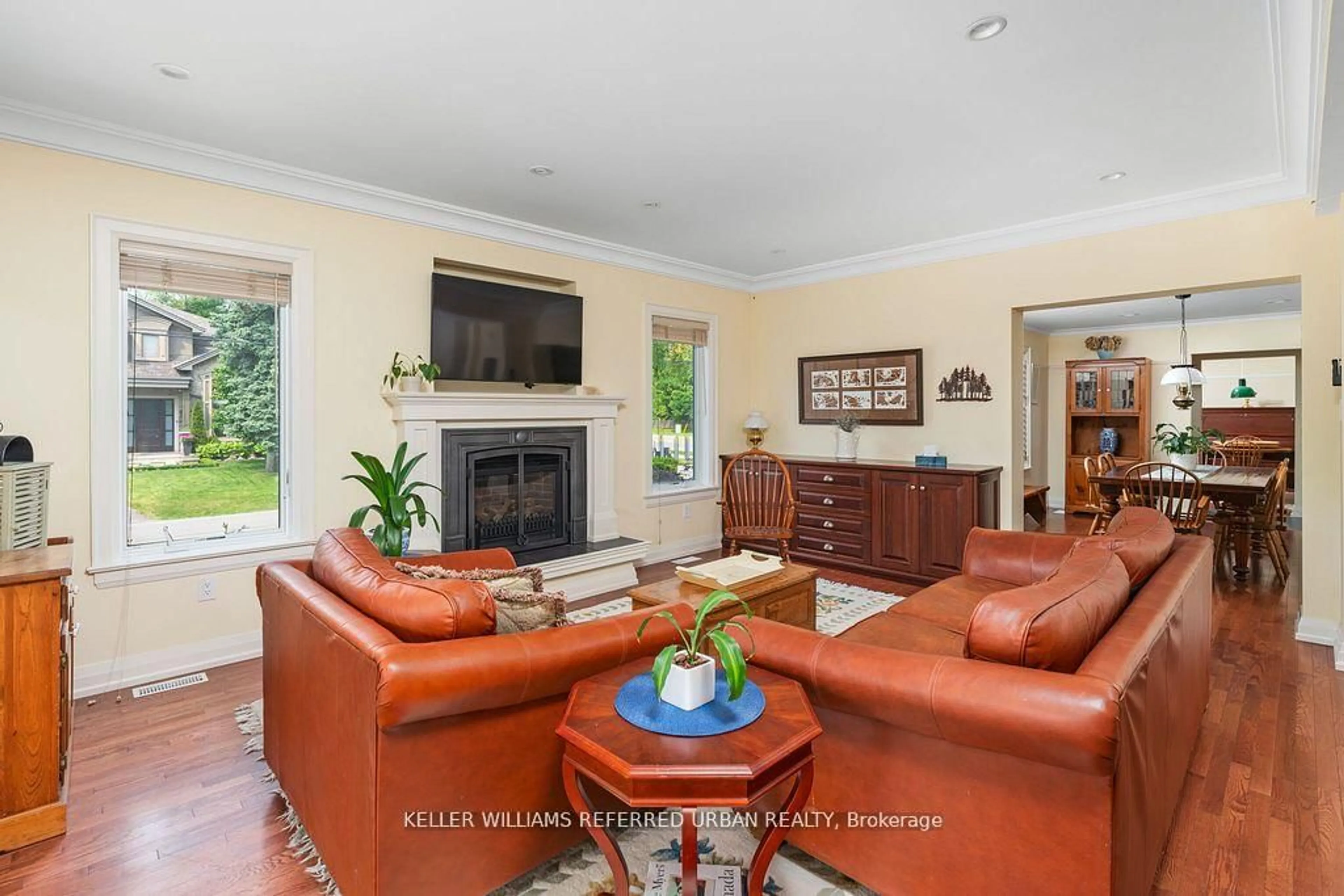Living room with furniture, ceramic/tile floor for 317 Rathburn Rd, Toronto Ontario M9B 2L7