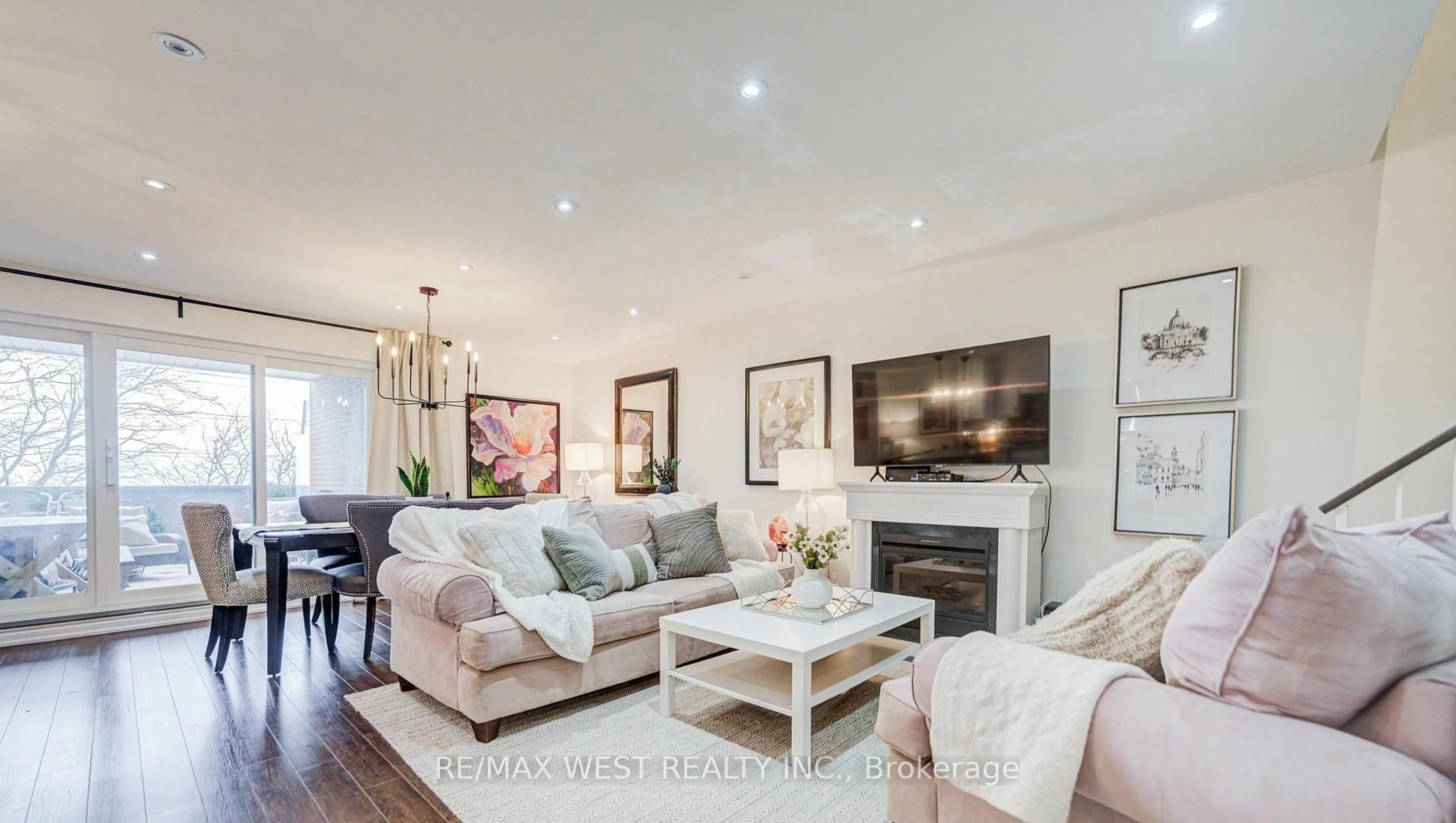 Living room with furniture, wood/laminate floor for 3025 The Credit Woodlands Dr #320, Mississauga Ontario L5C 2V3