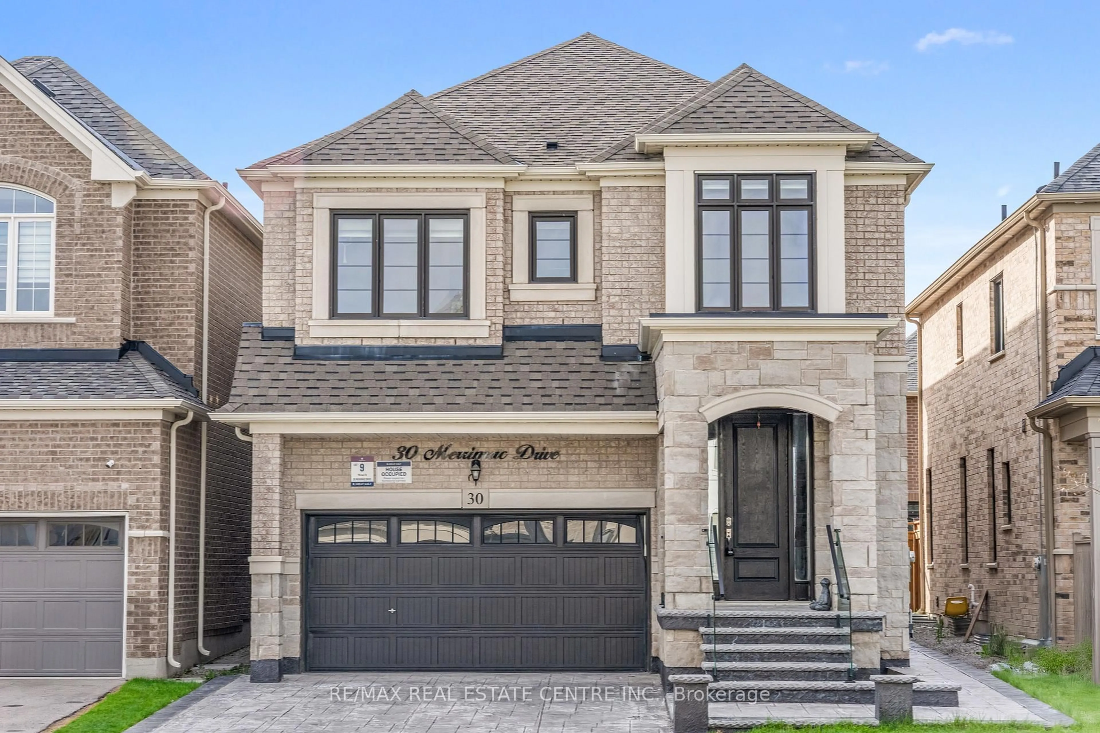 Home with brick exterior material, street for 30 Merrimac Dr, Brampton Ontario L6Y 6K3