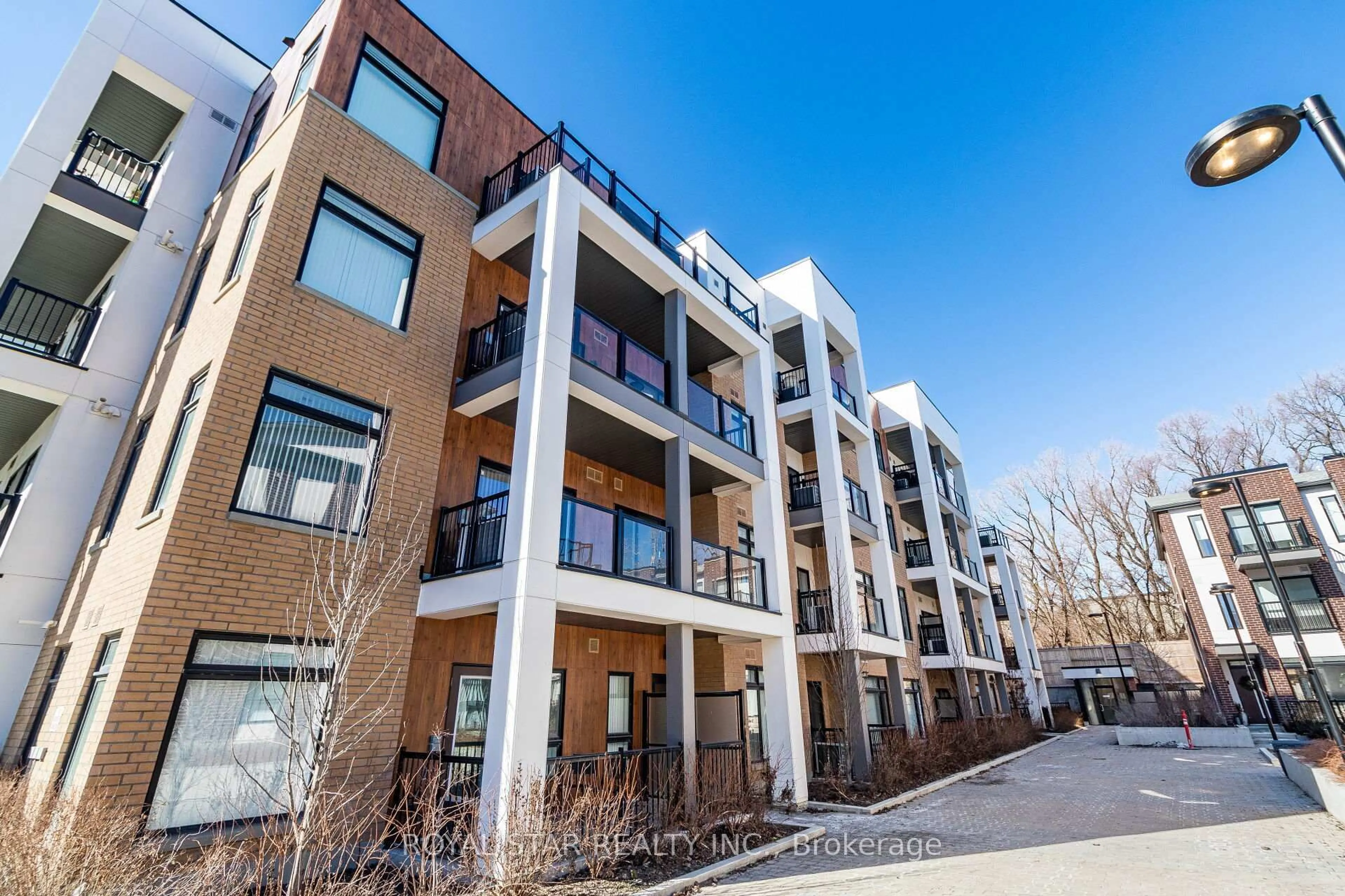 A pic from outside/outdoor area/front of a property/back of a property/a pic from drone, unknown for 120 Canon Jackson Dr #401, Toronto Ontario M6M 0E1
